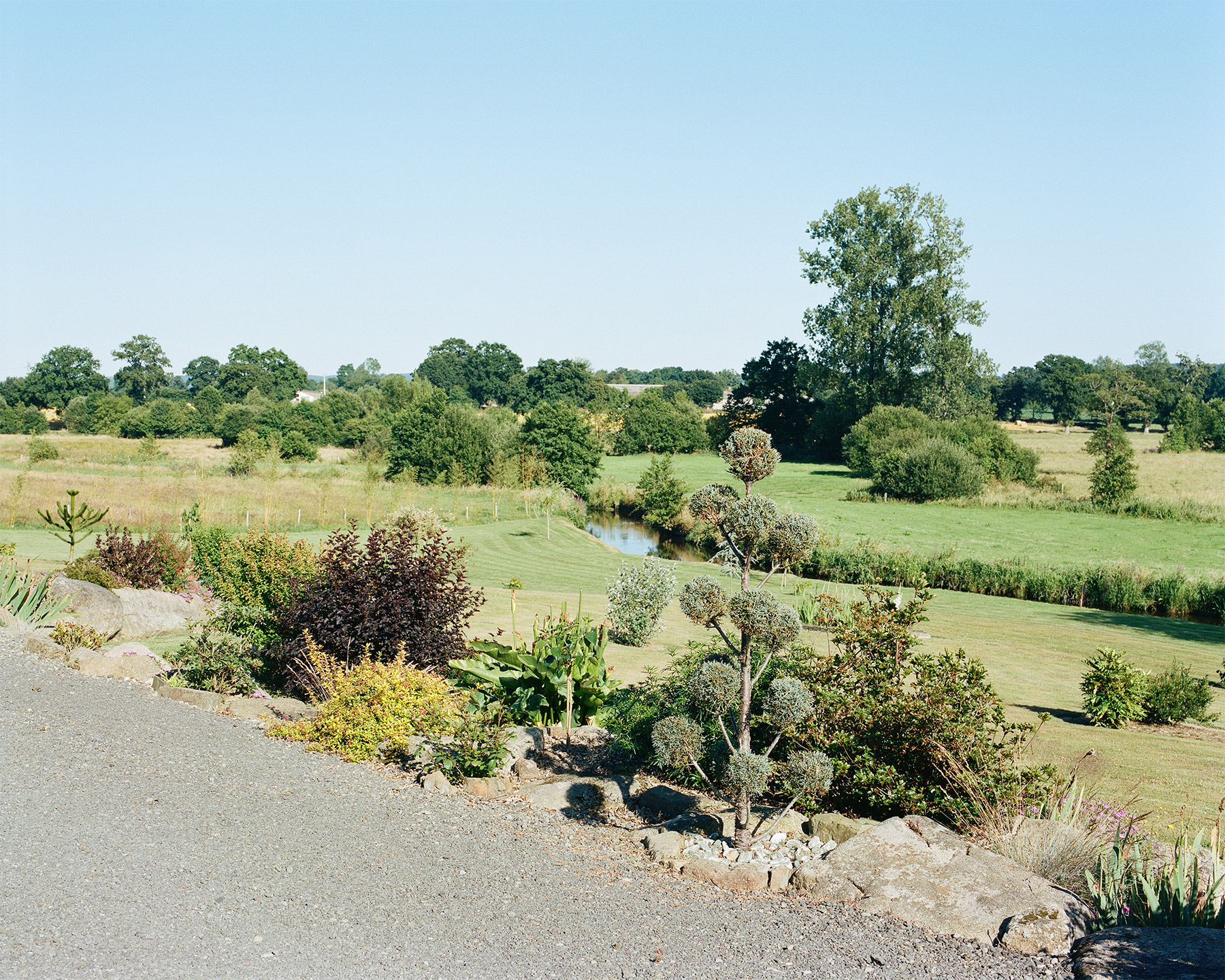 Jardin à la confluence de la Sienne et de la Sénène