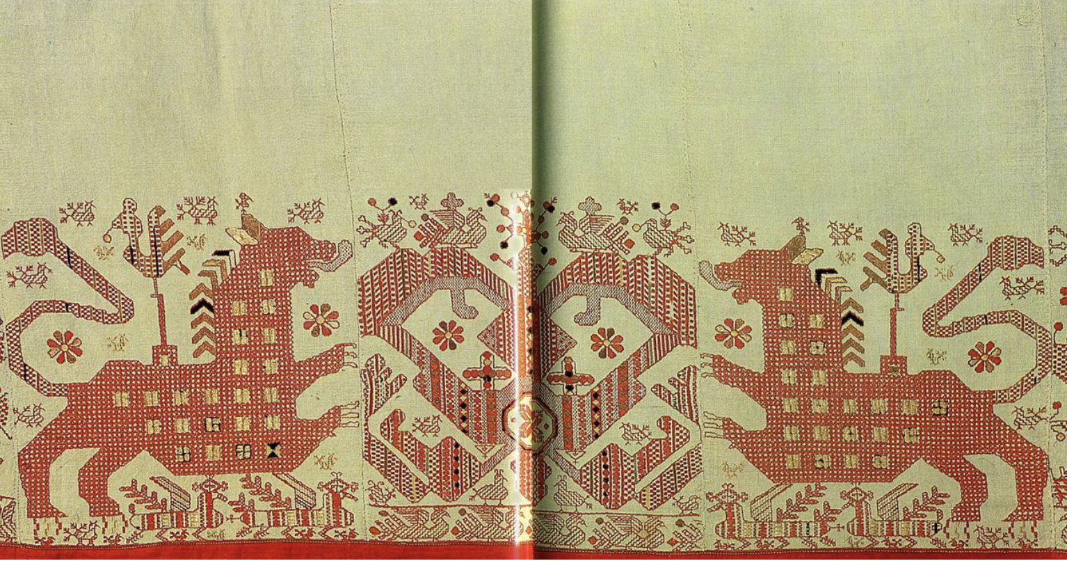 "SUN CHARIOT" WITH LIONS ENFRAMED BY BIRDS ON THE BODICE OF A KARGAPOL WOMAN'S SHIRT / Early 19th century / Olonets Governorate province, Kargopolsky district /Source: “Russian Folk Embroidery: Pictorial Motifs” by G. Durasov, G. Yakovleva / Image and description from Ornamika archive