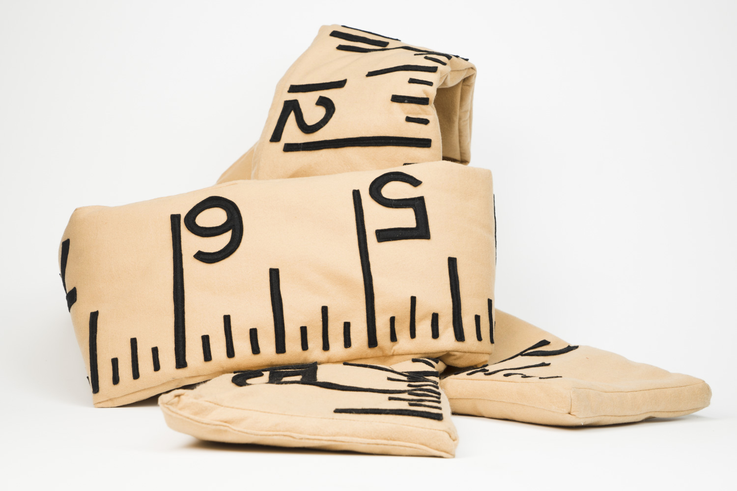 Drastic and Innacurate Measures, 2016. felt, cotton batting.13" x 21' x 2.5"