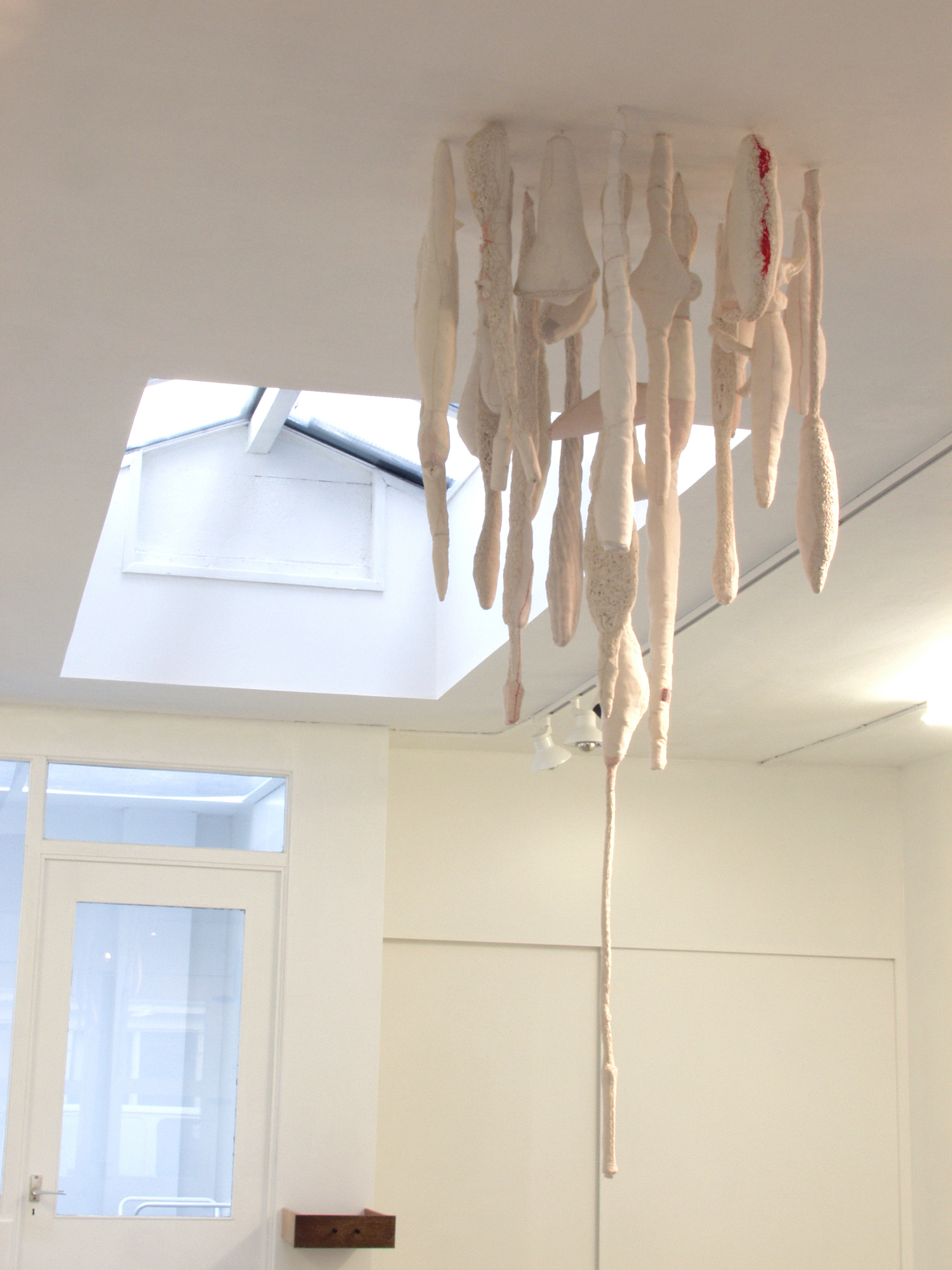 White Shirts, 2000/2001 . 28 embroidered white shirts (detail)