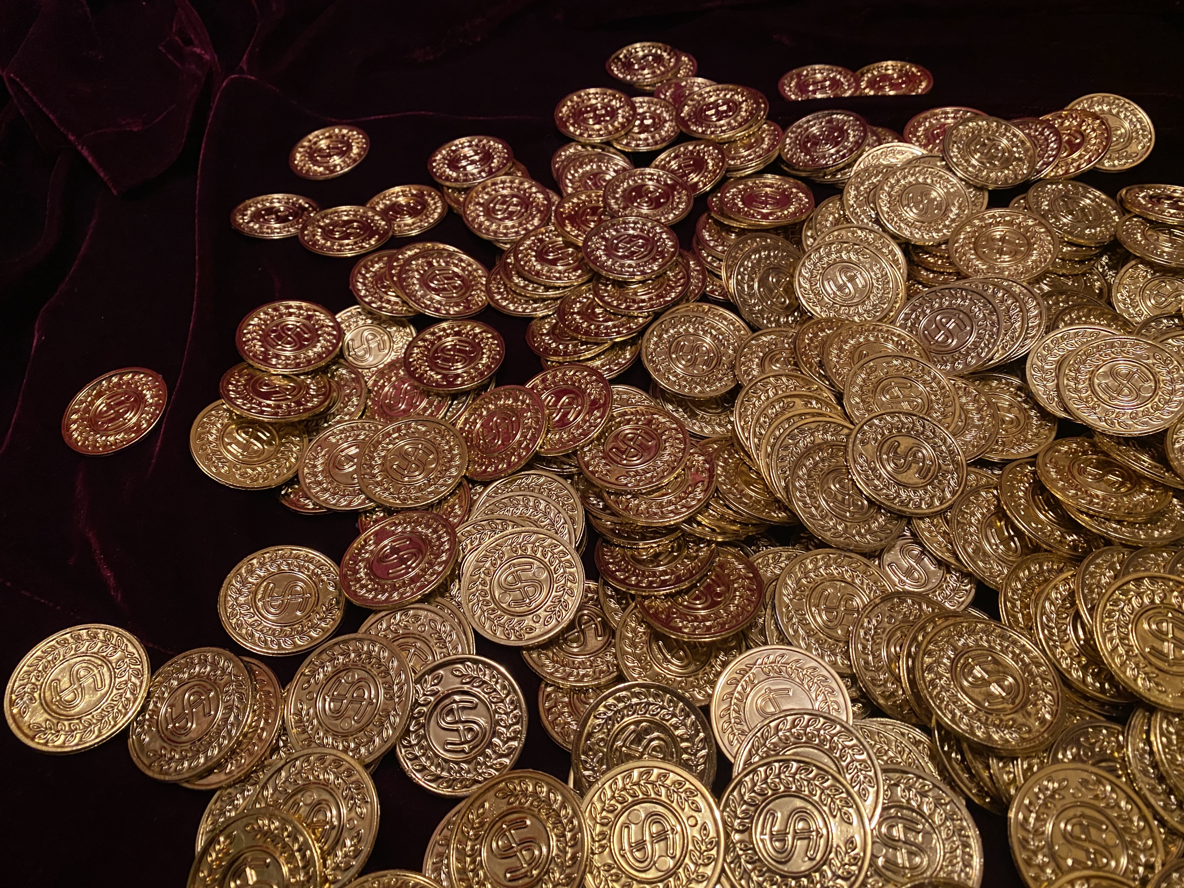 Dana&euml; (2026), installation of plastic gold coins and soundscape, variable