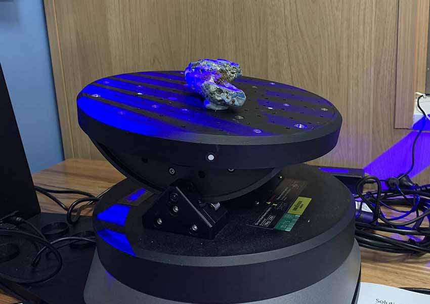 FIGURE 23 Photograph of plastic sample being 3D scanned.