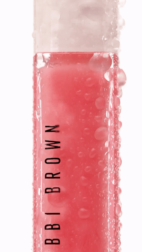 KMA stylist Rachel Haas designs set for texture photo of smeared tan concealer on black background for Gucci