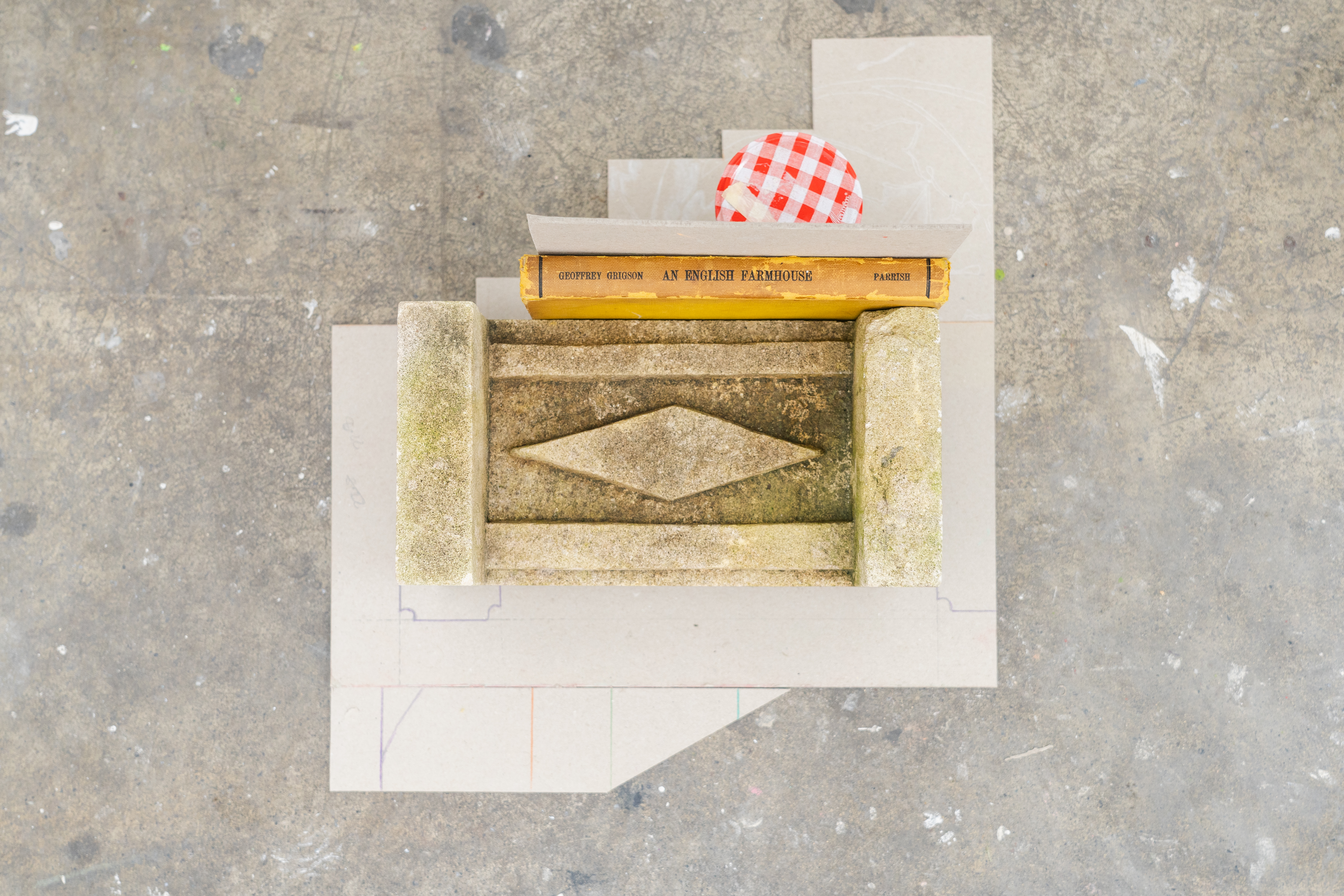 card, stone, book, acorns, Bonne Maman glass jar