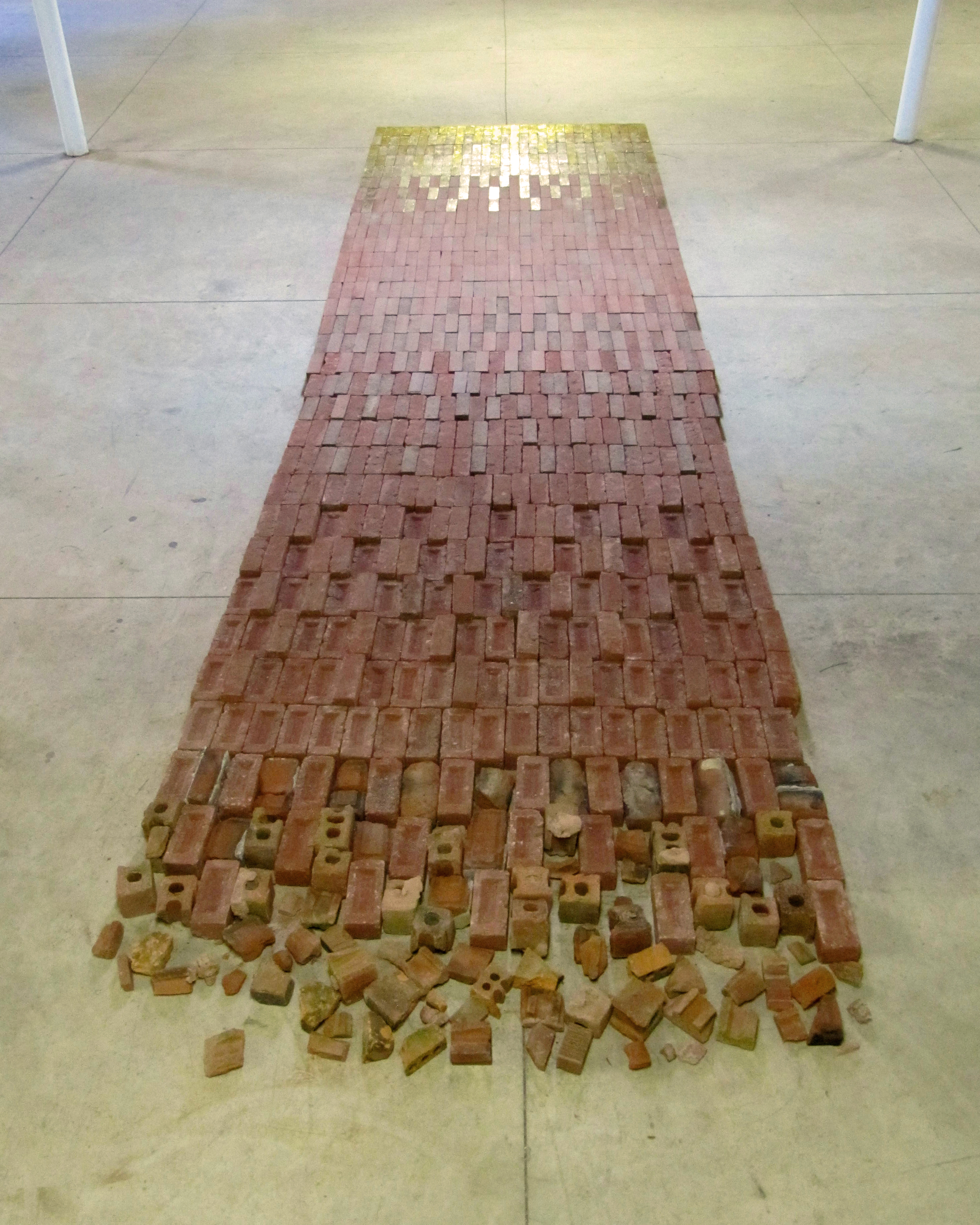 Some Kind of Way, 6 x 25 feet x 3.75 inches, 1,000 bricks and hot-pressed foil