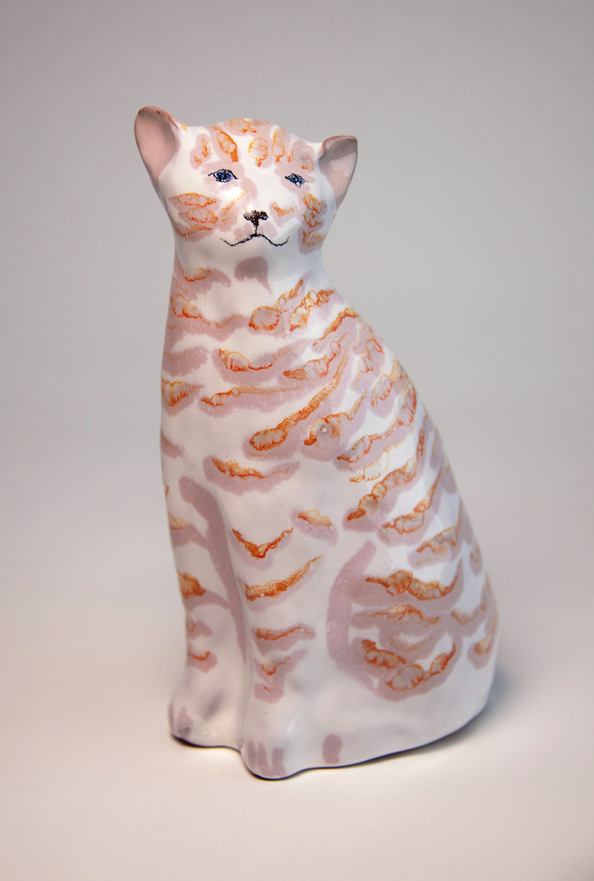 Marmalade cat sitting. SOLD