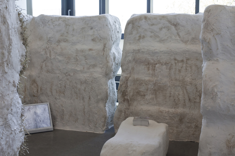 Untitled, 2013, variable size, hay bales, plaster, chalk-board paint, chalk, video, postcards