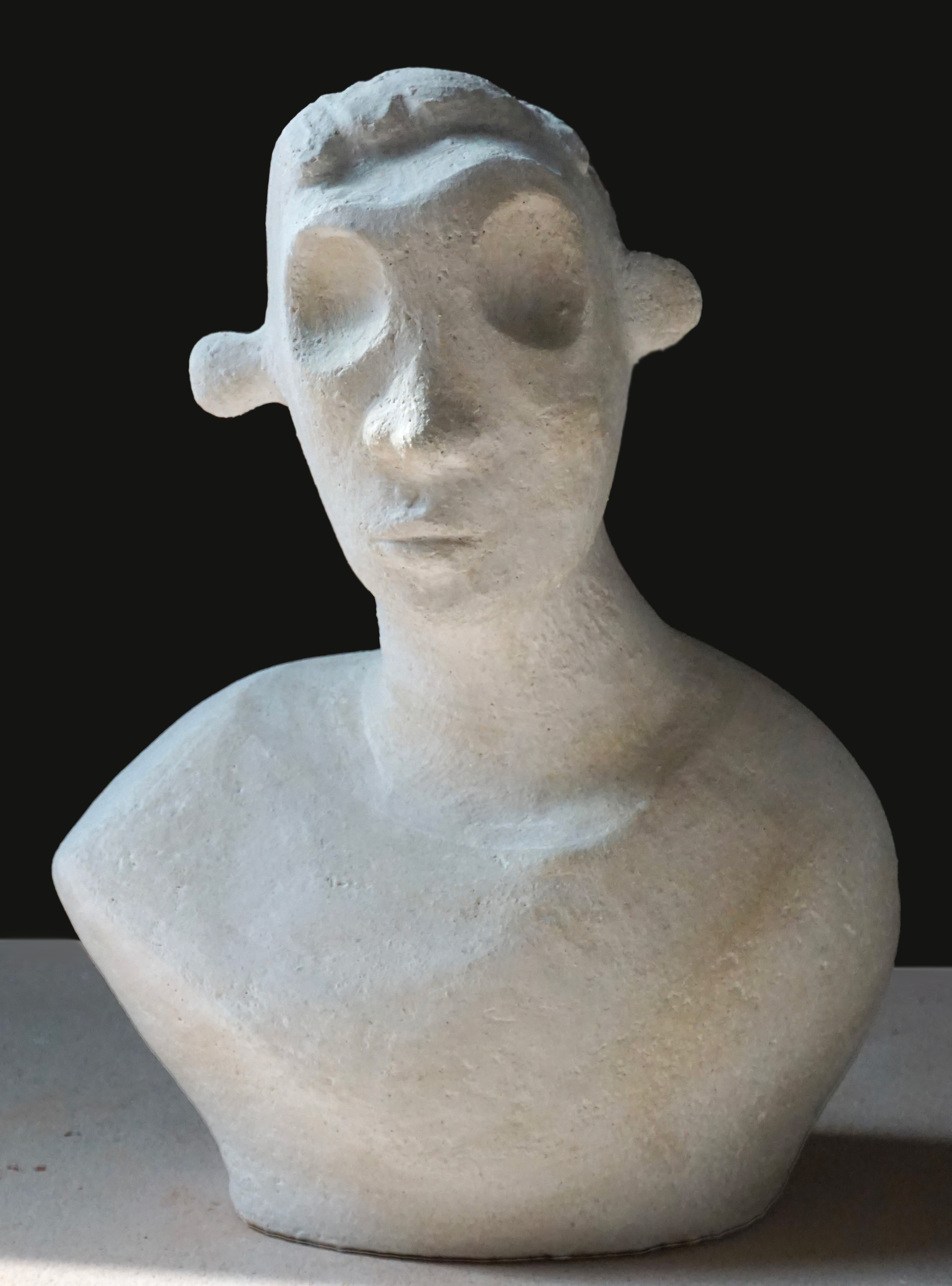 Alex II (after his self-portrait), 10.5 x 8.5 x 5, ceramic stoneware with white underglaze