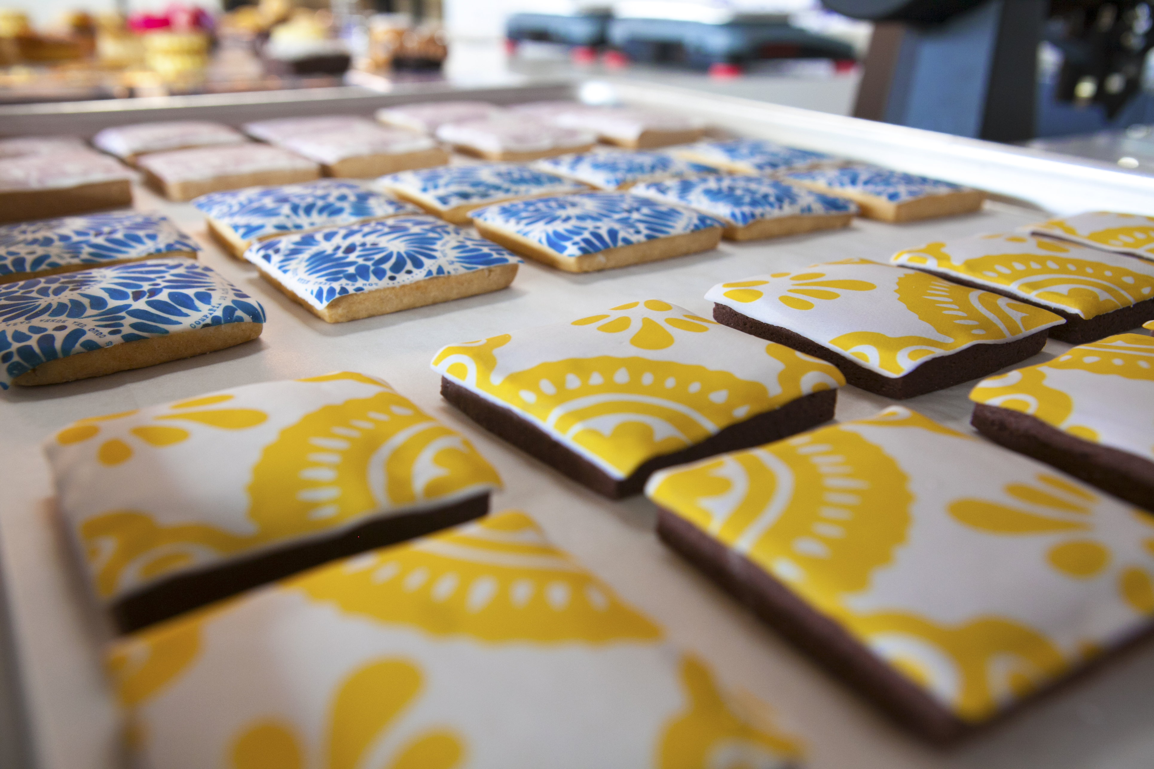 Close-ups of Daniel Gonzales’s Iconography and Talavera patterns on pastries.