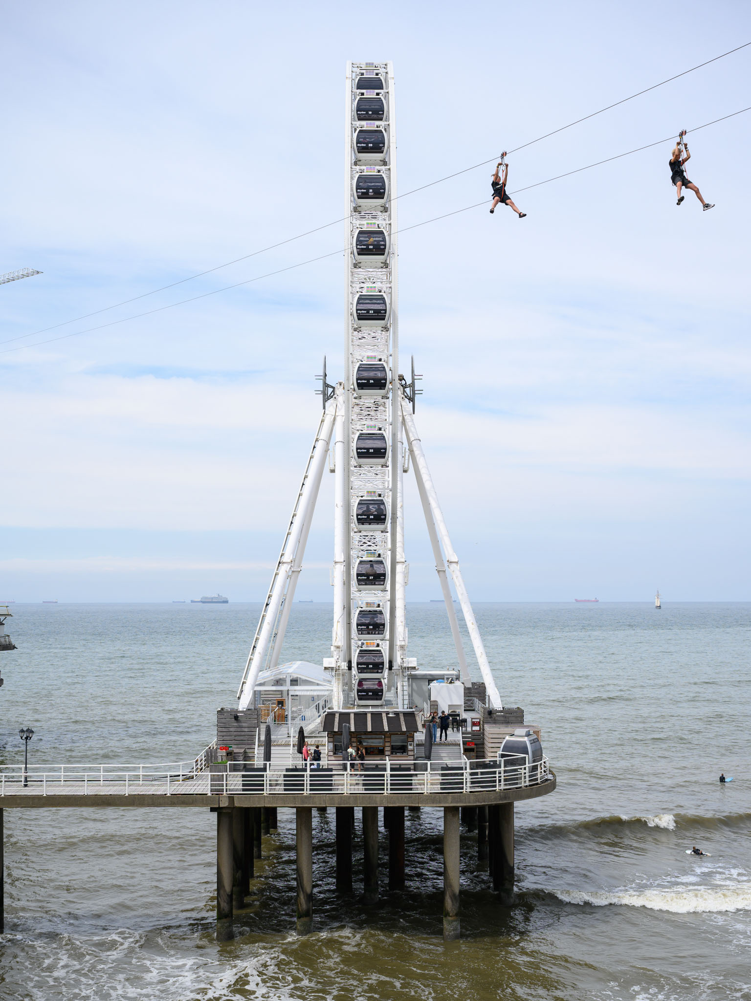 Ferris wheel and zipline at the pier.
