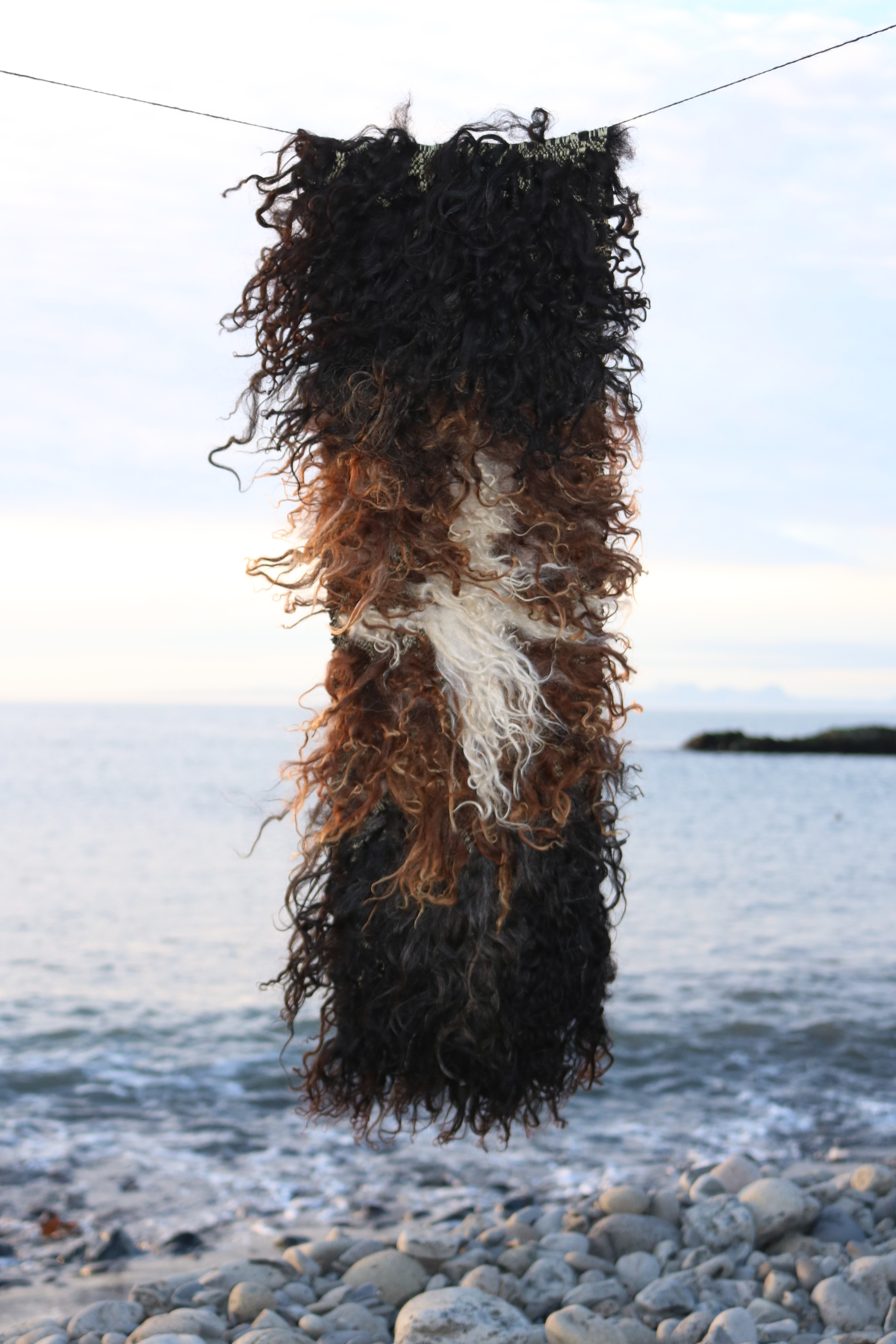 Star; I've touched every hair on some distant head, woven wool, 10" by 39" 