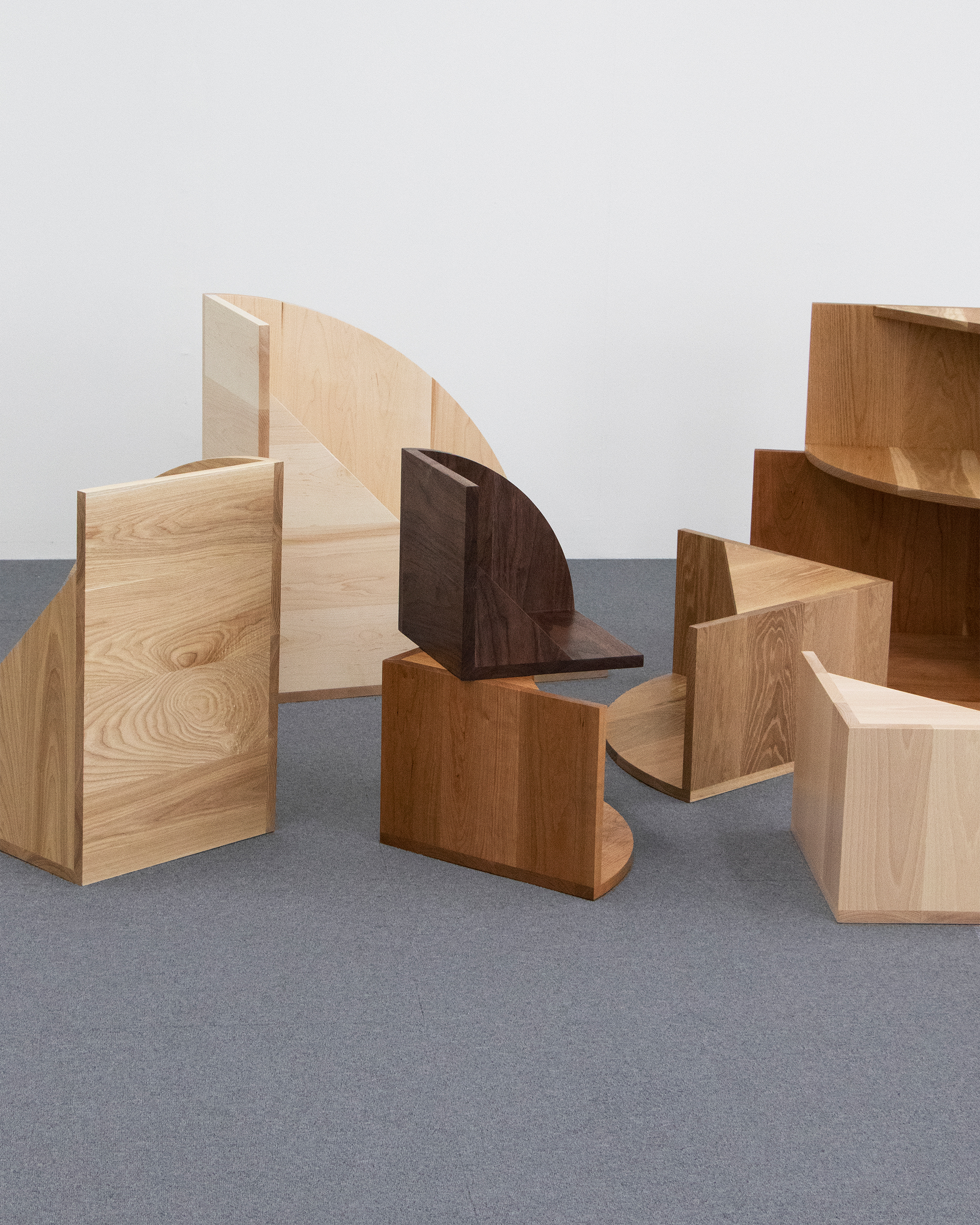 kuo duo experiments with wood techniques in word play furniture series