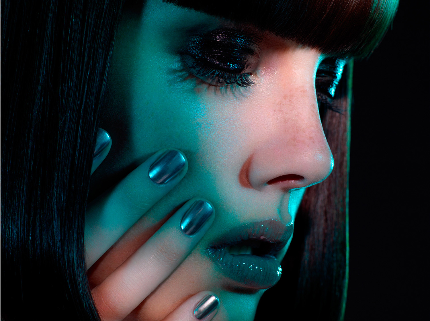 KMA photographer Isabelle Bonjean shoots model with dark hair in dim lighting for Gloss Magazine 