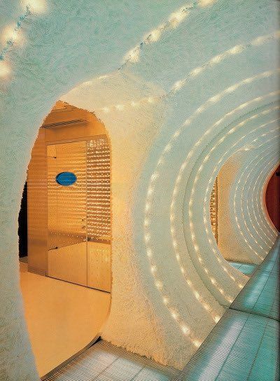 A spherical hallway in Lenny Kravitz's Miami home covered in plush white fabric.