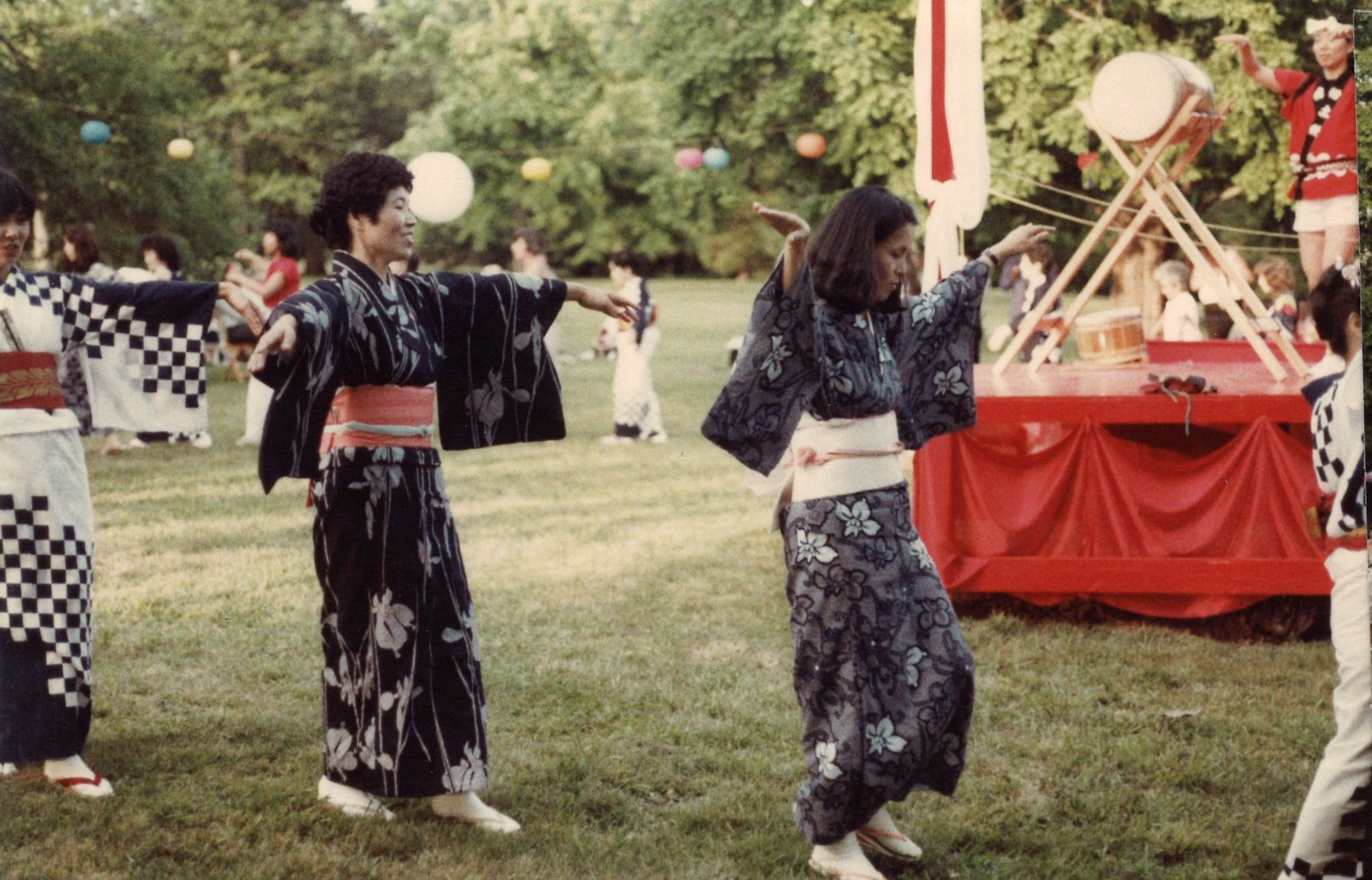Taeko Shervin (left) and Michiko Bley (right) dancing during the Obon Festival, 1983