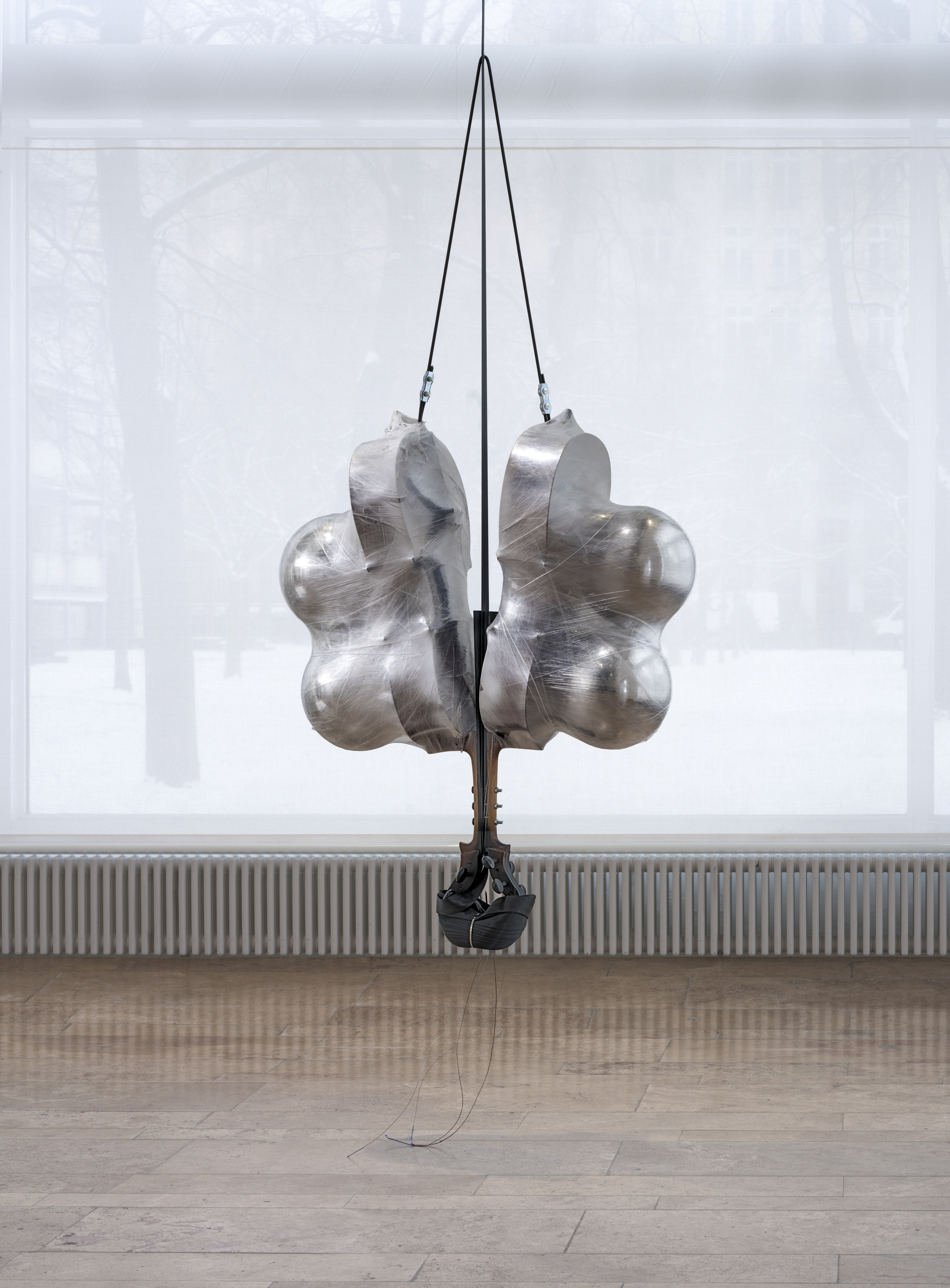 Phaedrus, 2024, Cellos, cellophane, chrome-plated steel, spray paint, seat-belt webbing, bolts, shock cord 133 x 110 x 45 cm 52.4 x 43.3 x 17.2 inches