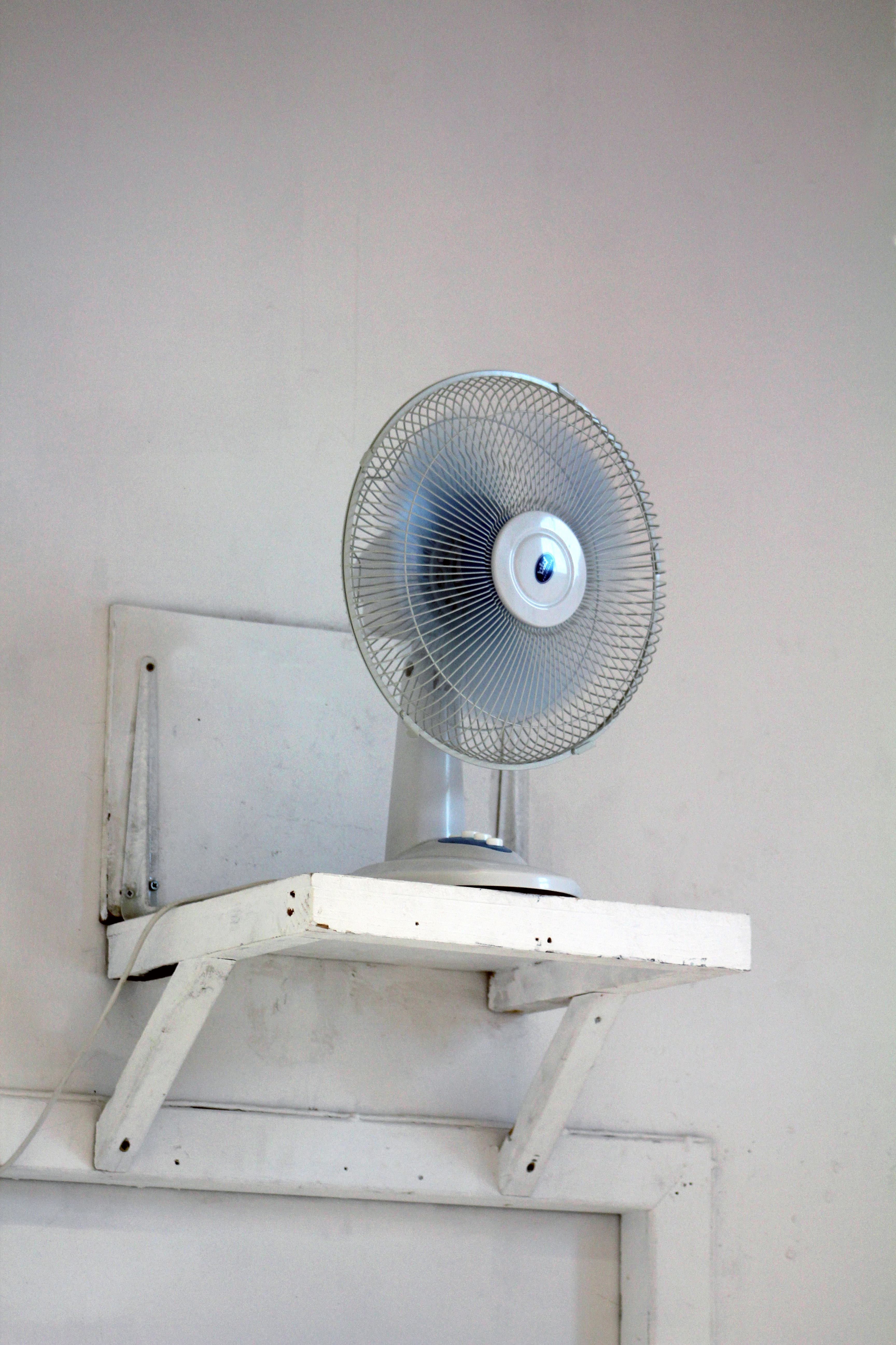 A desktop fan activates the banners to inhale/exhale into each other at intervals
