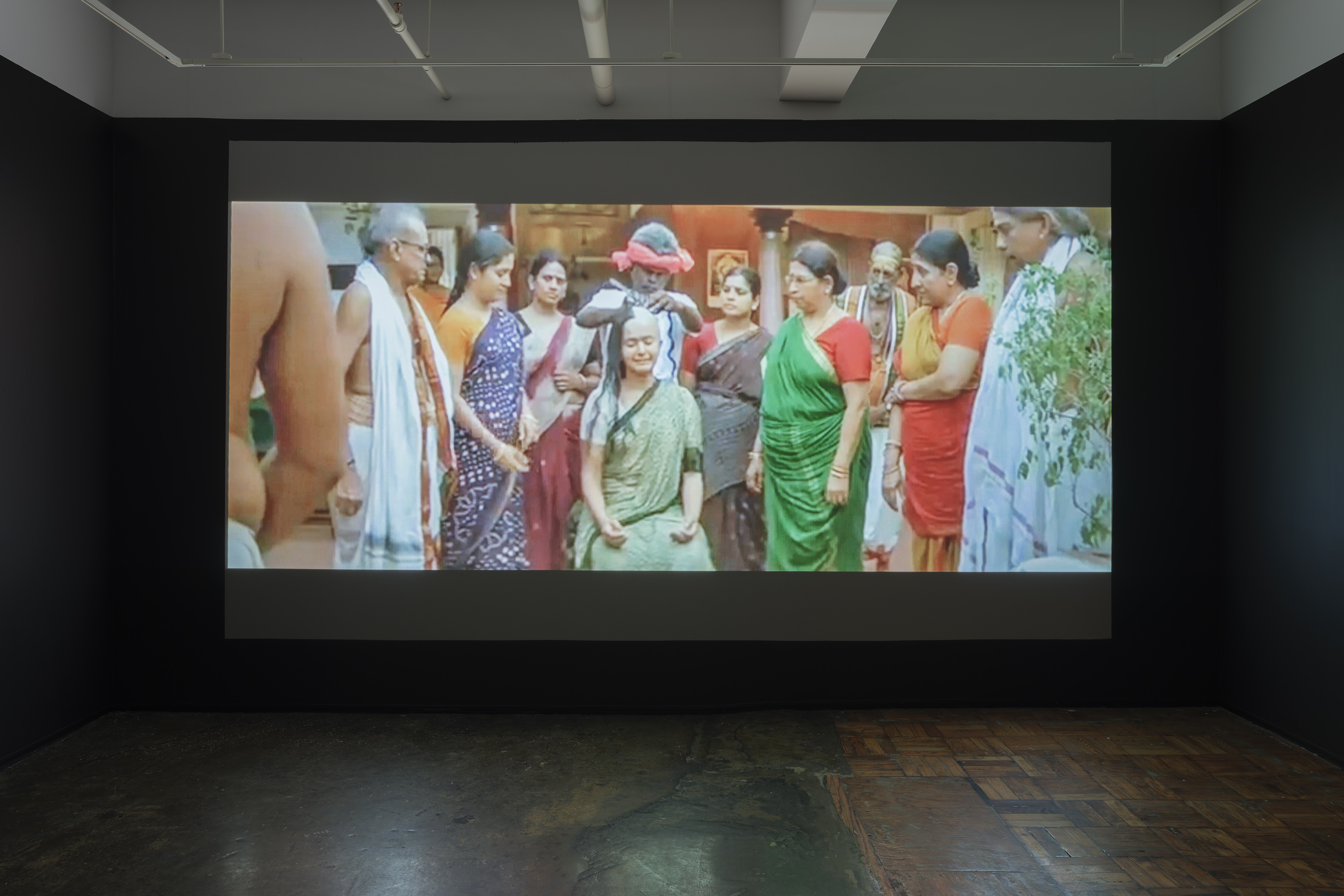 10/11 — THE HAIRCUTThe Haircut reconstructs selected scenes from movies where female characters cut their hair or have their haircut unwillingly. Reasons range from pretending to be a man to compete in a horse race (National Velvet, 1944), embodying a feline aesthetic as a vigilant antiheroine (Catwoman, 2004), aligning with male military standards (GI Jane, 1997), to retaliation by classmates for being involved in a severe cyber-bullying case (We Not Naughty, 2012).The provided file hosts a ten-minute excerpt from the project. The full-scale work contains close to 600 scenes with an approximate duration of 18 hours, to be presented as a single-channel video installation.Video, 18 hours, 2018-2020. Installation images at AIR gallery by Sebastian Bach