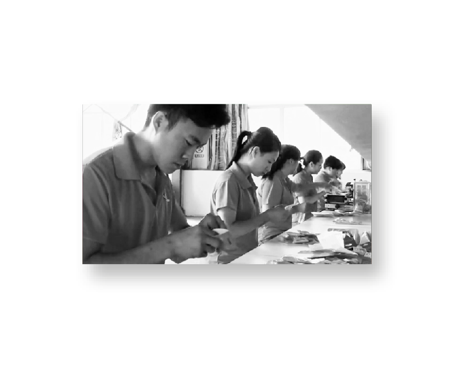 Video still from a promotional clip of a Chinese rosary company
