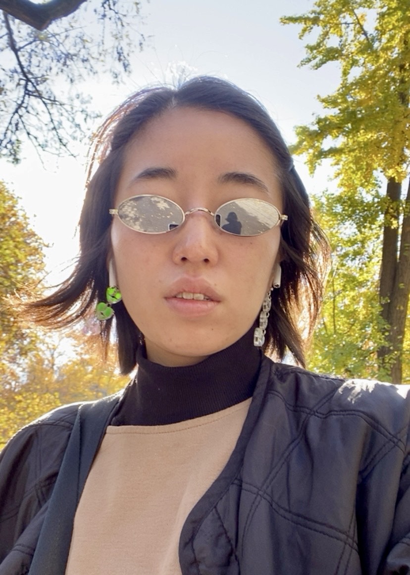 Wearing my acrylic earrings in  Central Park