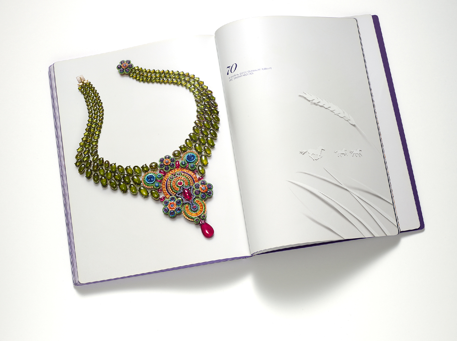 KMA photographer Isabelle Bonjean shoots photograph of jewelry book for Chopard against white background