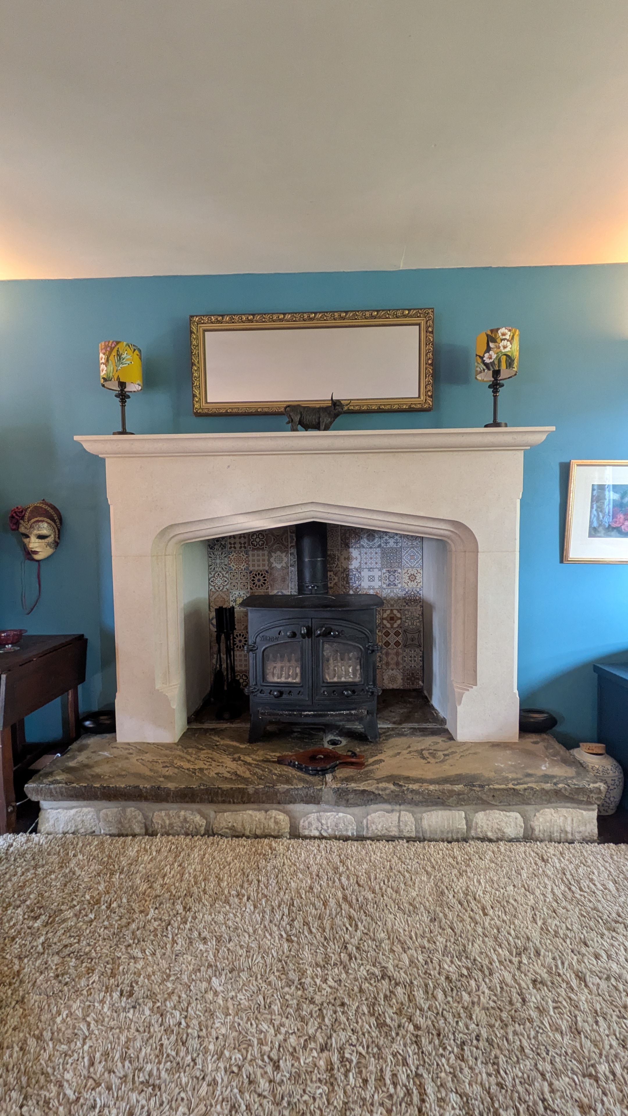Tudor in Bath stone on flagstone hearth