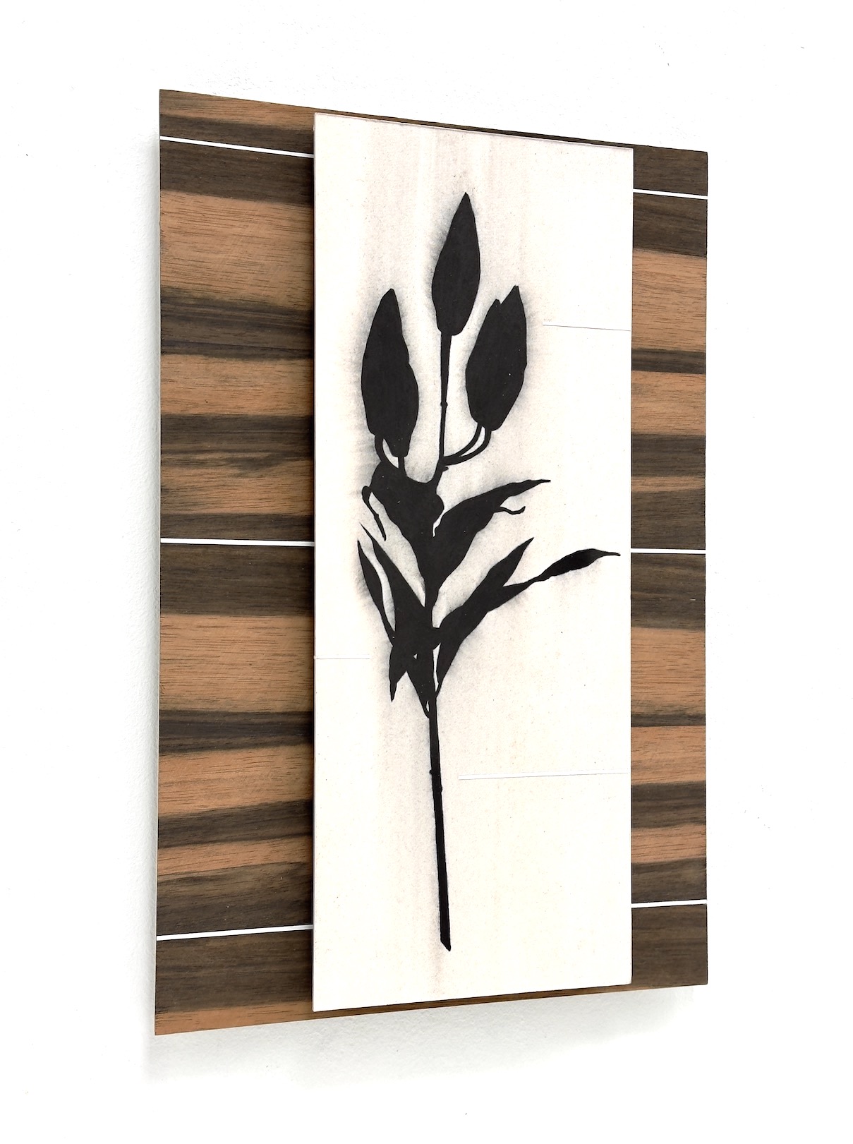 ‘Reasons to be cheerful’, 2024, conté pencil and acrylic on paper/aluminium and Macassar ebony wood veneer/aluminium, 30 x 20 cm.