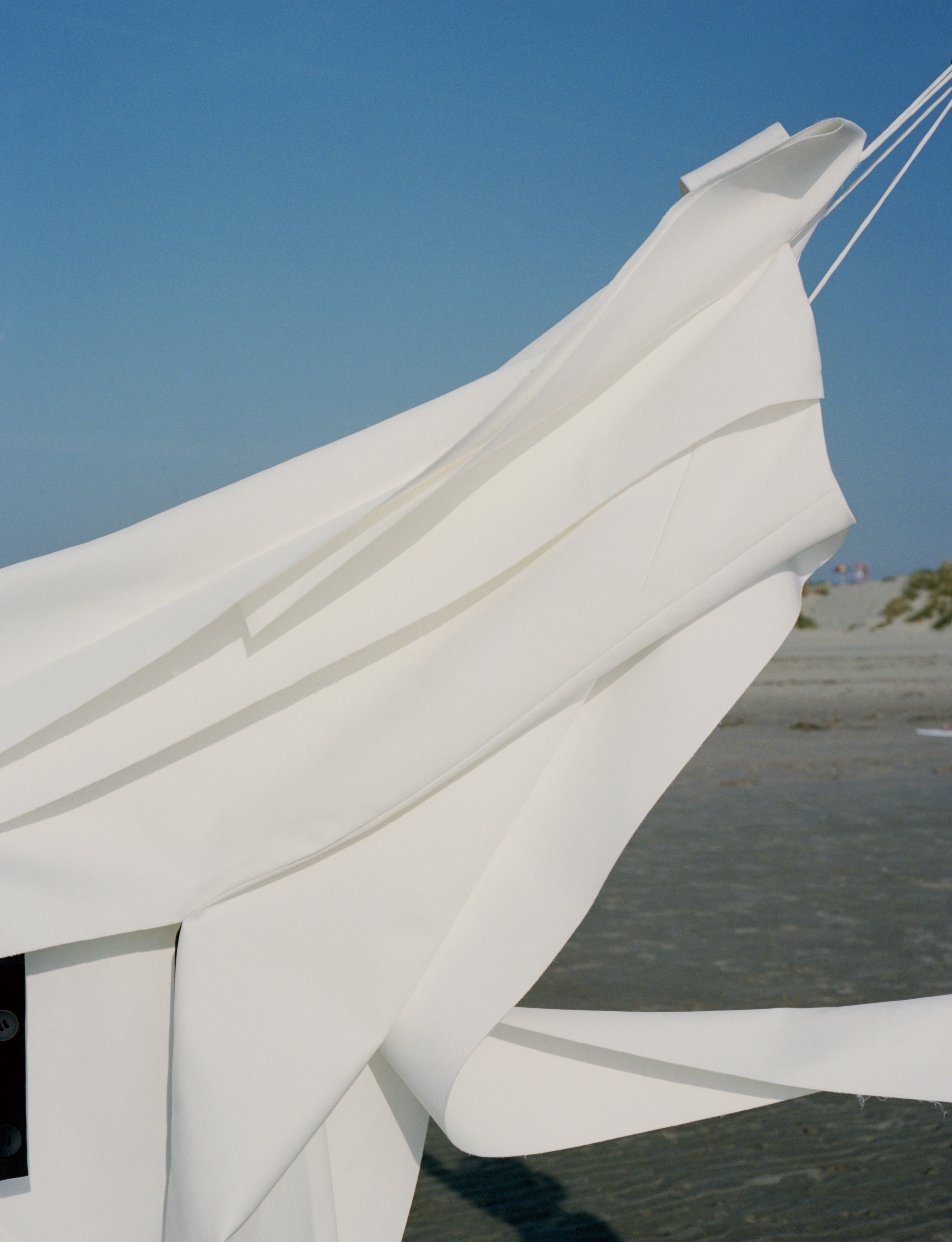 ‘... its powder blue awnings like reefed sails’. (1/8)