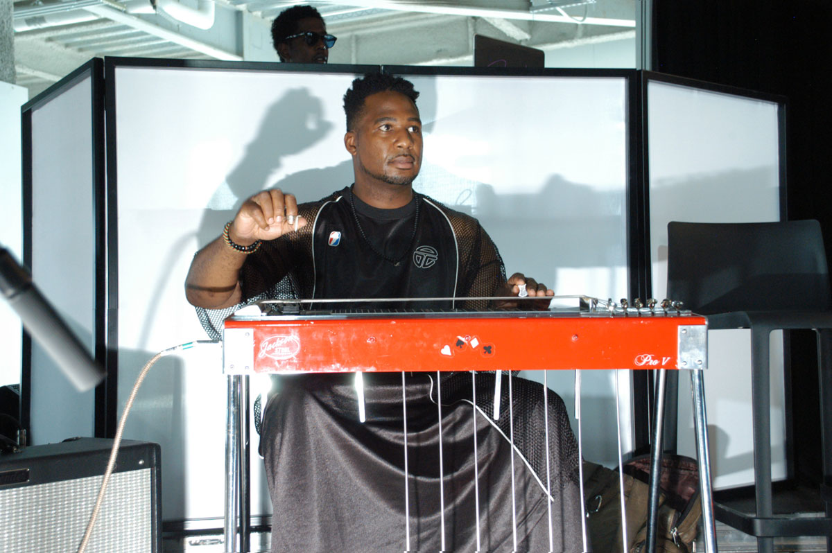 DJ playing at Telfar TV Press Conference