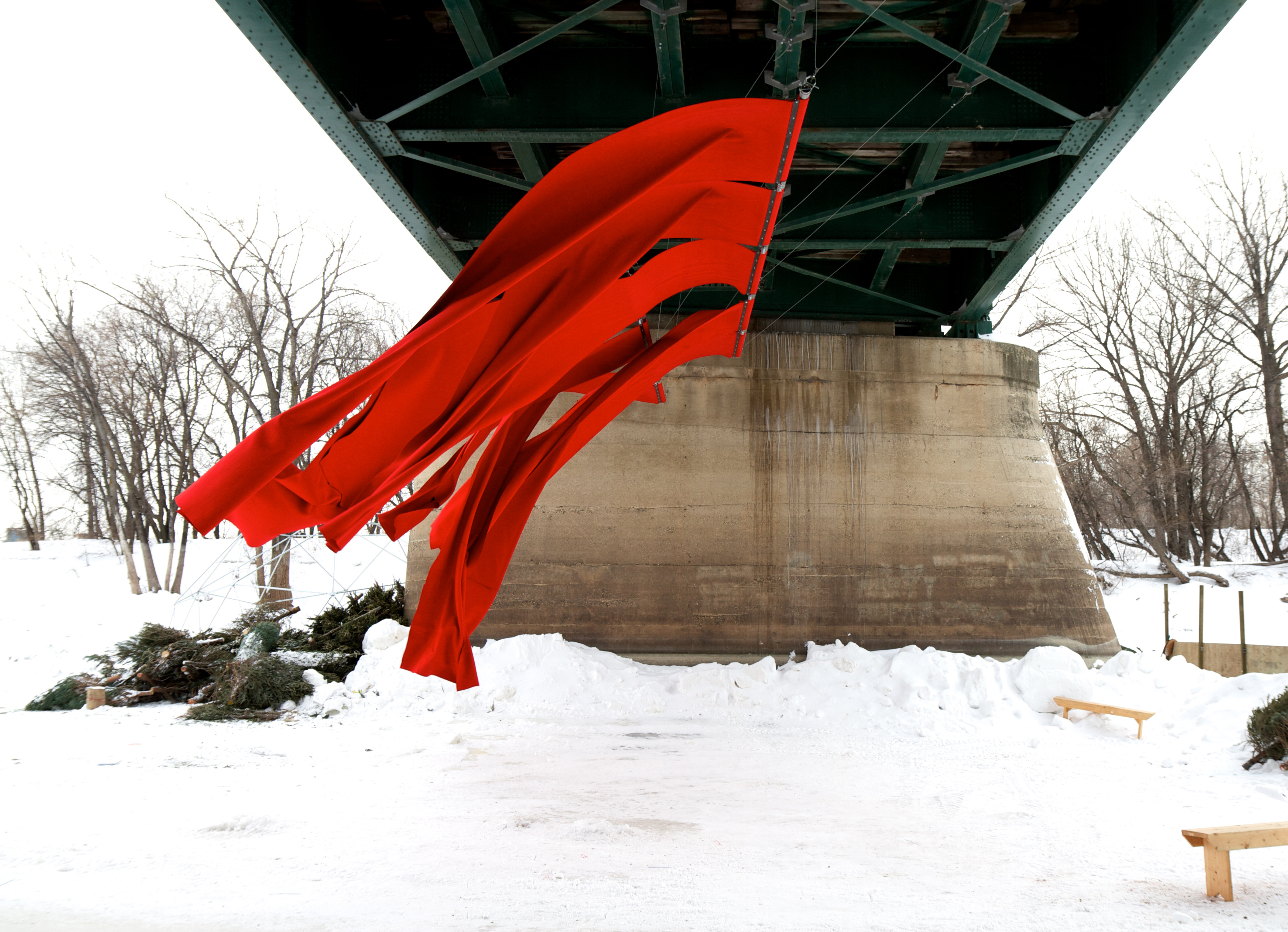 Red Blanket installation blowing in the wind