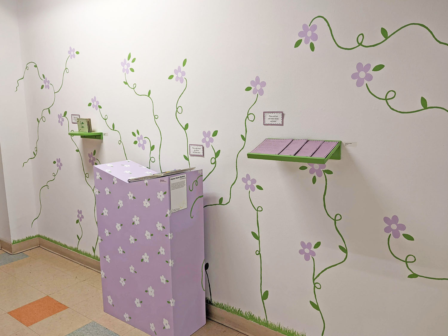 Familiar Flora & Fauna complete installation2022, Hand bound book, embroidered screen printed book, embroidered risograph prints, screen printed and painted wall and pedestal mural