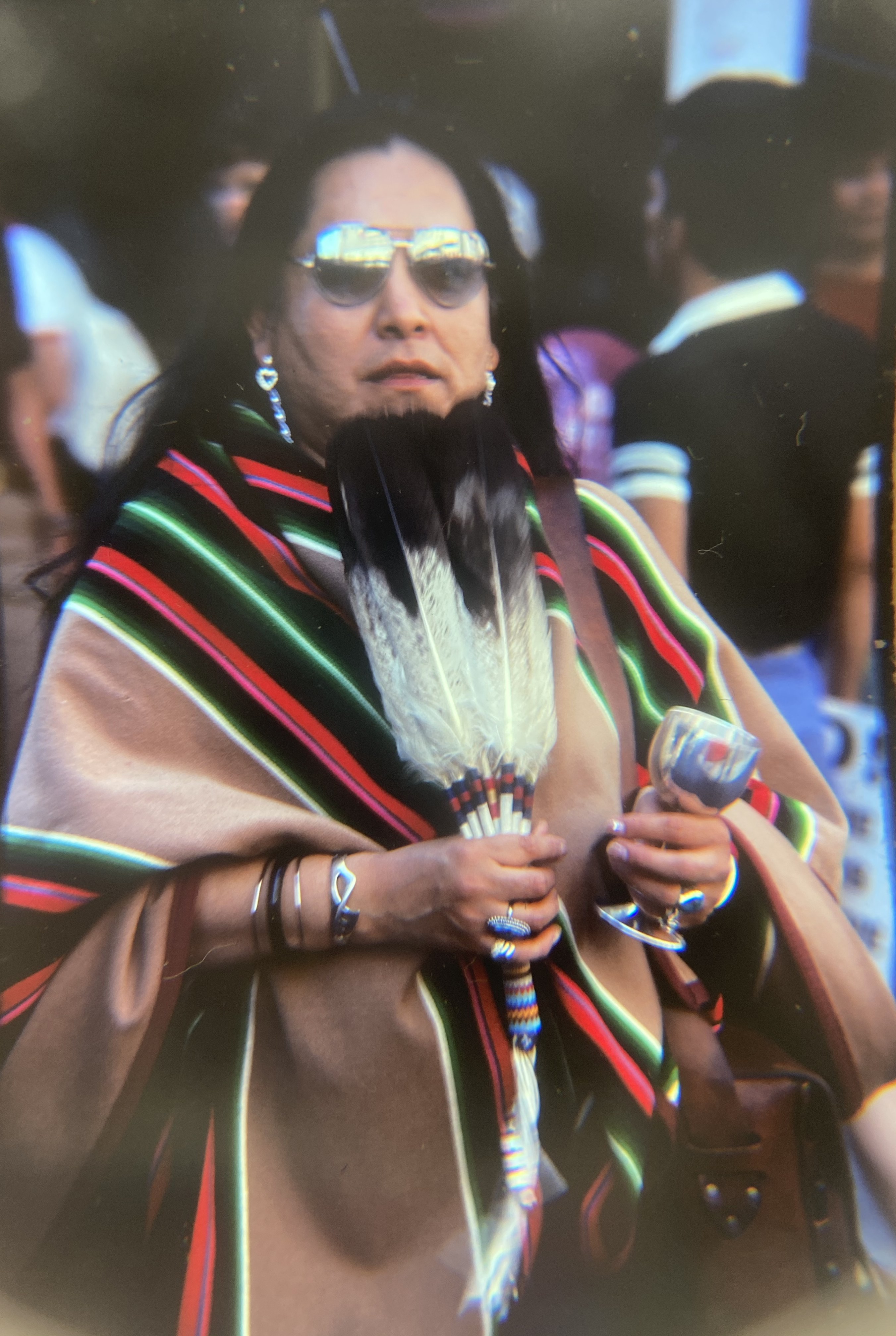 A member of Gay American Indians marches in the 1978 Gay Freedom Day parade, [Crawford Barton papers (1993-11)], Courtesy of Gay, Lesbian, Bisexual Transgender Historical Society.
