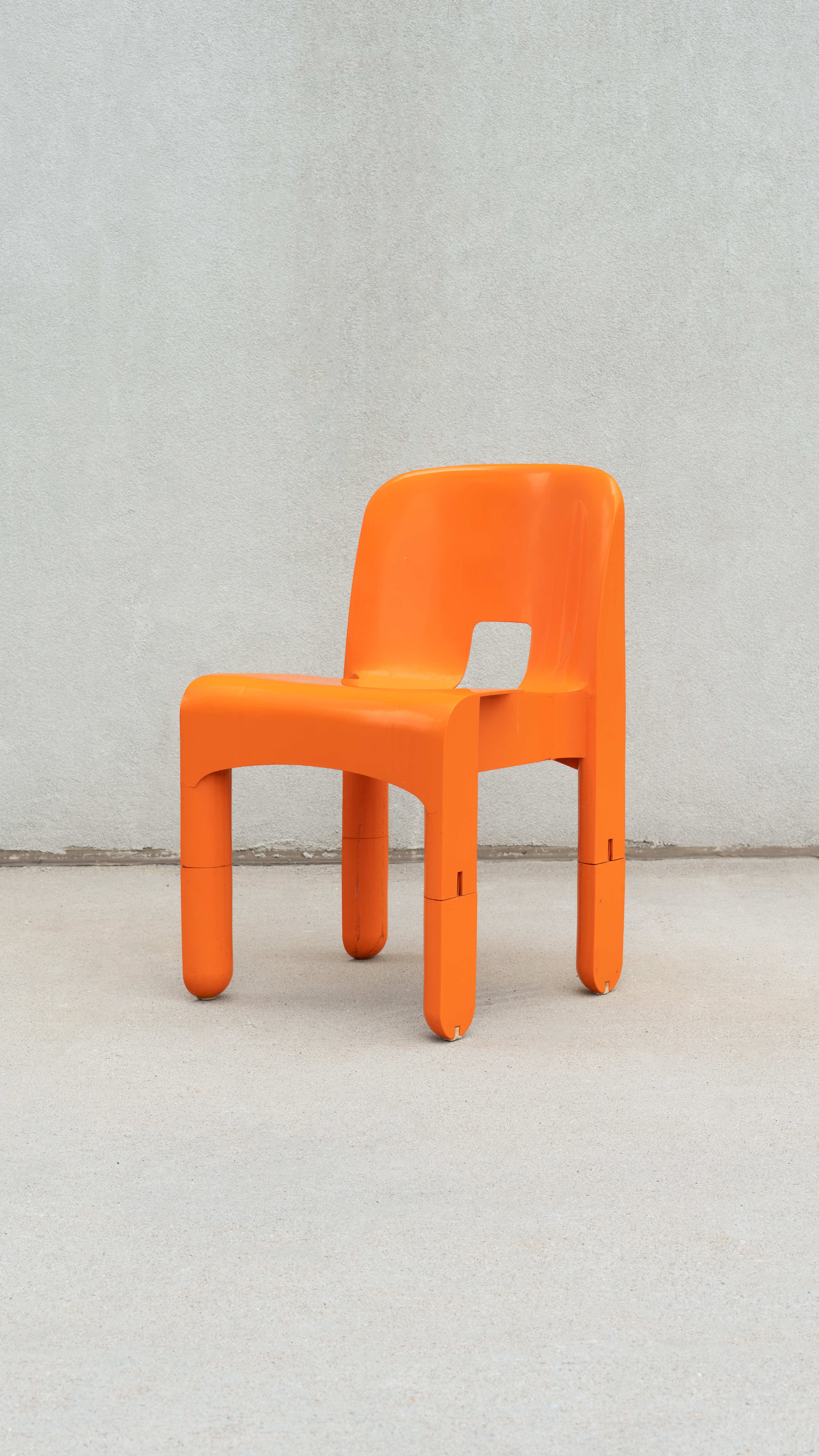 SWEETERFAT KARTELL UNIVERSALE CHAIR PRE PRODUCTION ORANGE BLACK WHITE PLASTIC SPACE AGE CHAIR DESIGNED BY JOE COLOMBO 