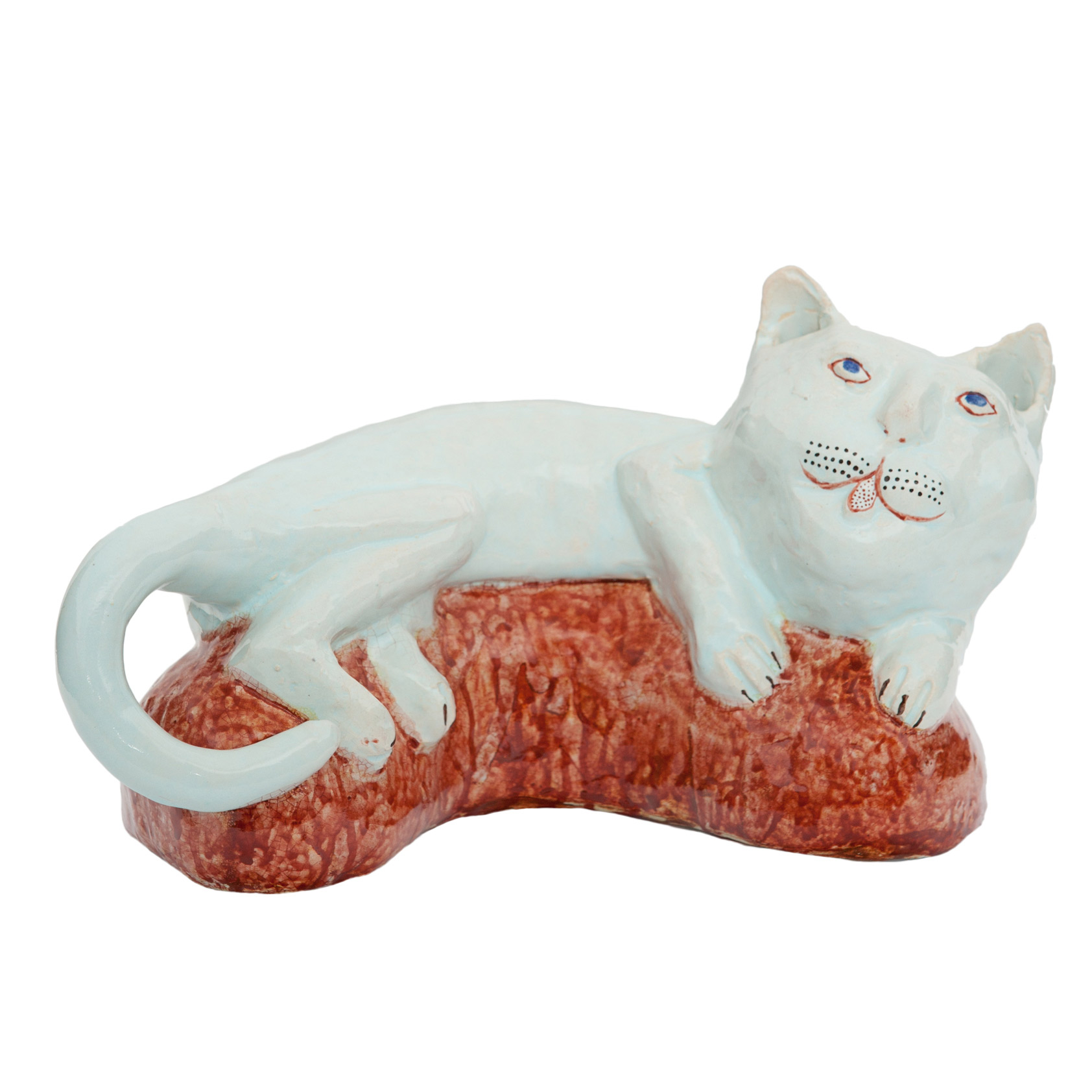 Reclining cat on red base, 2.11.10Glazed ceramic stoneware