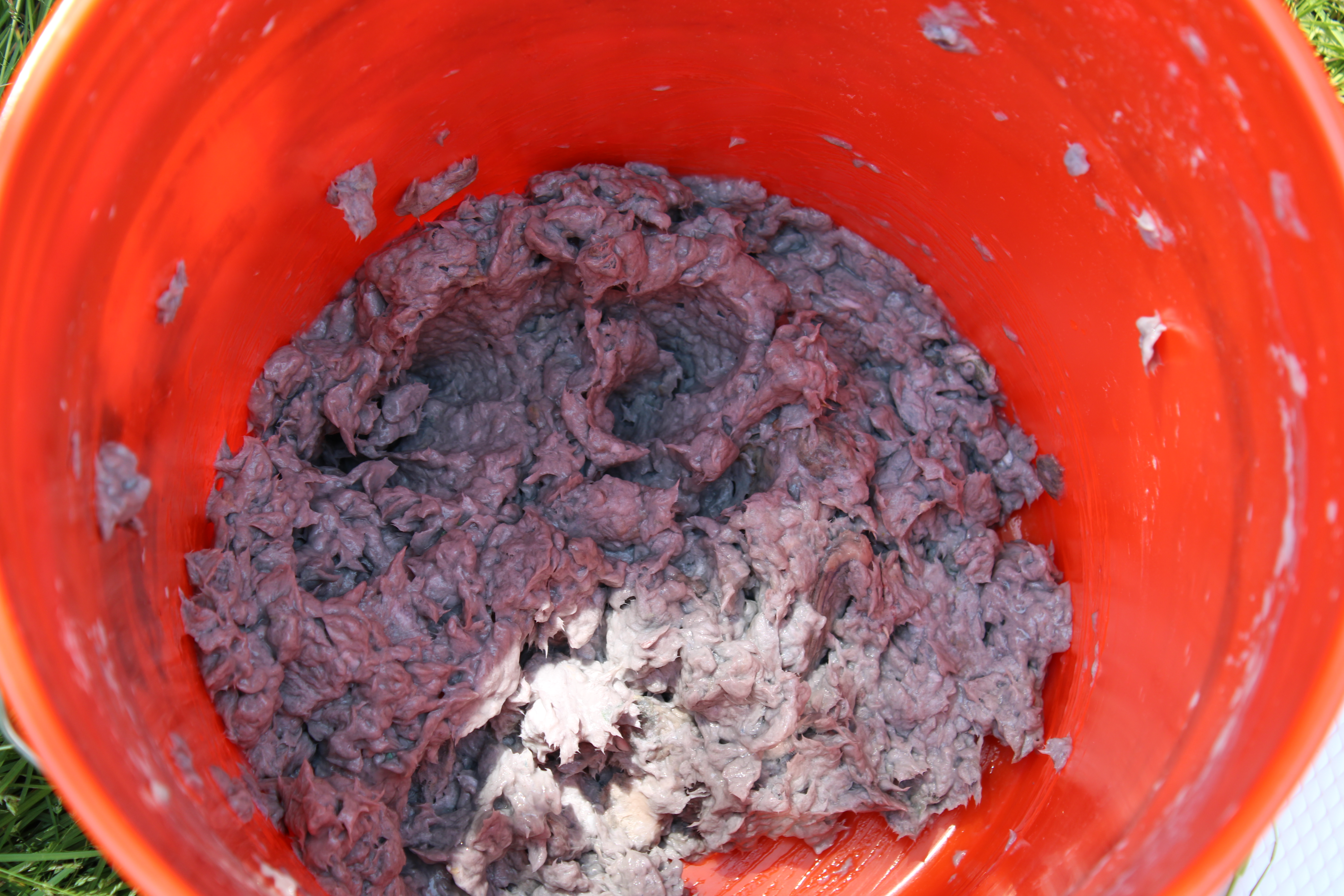 Adhesive mixed into the paper pulp.