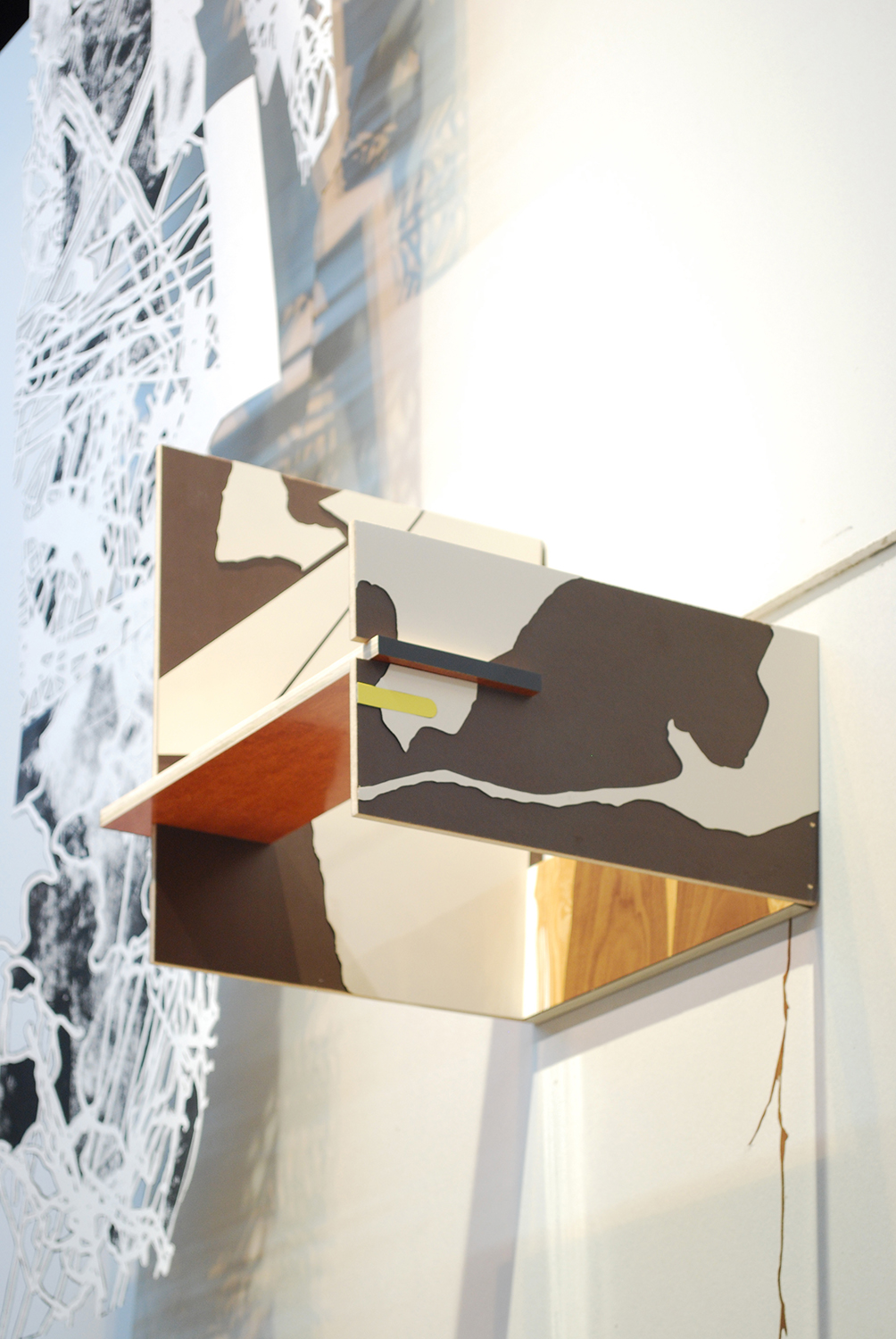 ako / avd  Ink, graphite, colored pencil, contact paper, and block prints on paper and drywall. Wood, formica, flooring, drywall and pushpins.   2009 - 151 x 43 x 68