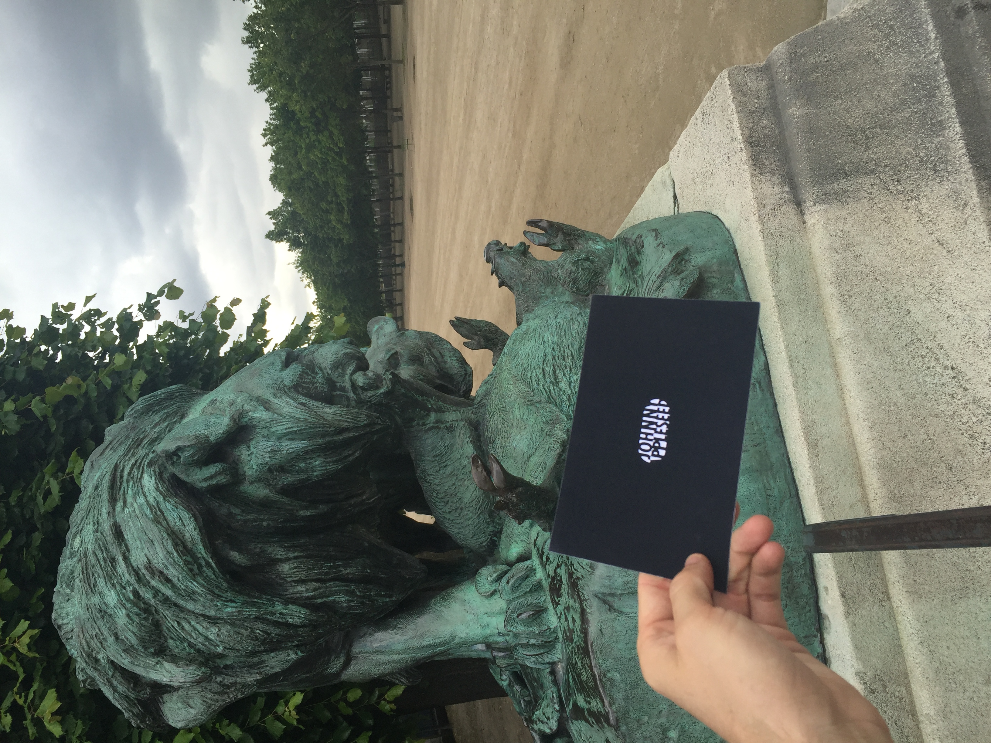  I left it nestled in a statue in a garden next to the louvre in Paris where I imagined a kid might find it. 