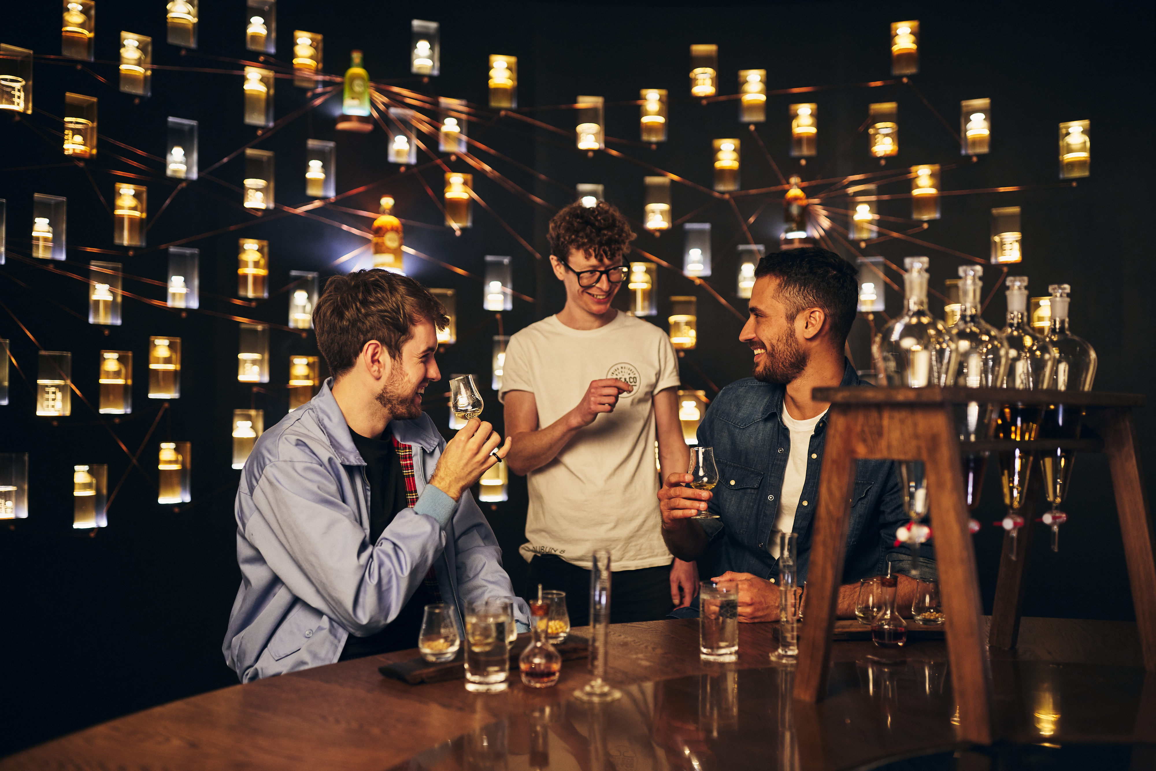 Lifestyle photography of the Roe & Co whiskey tasting and cocktail making experience in Dublin, Ireland. Captured by renowned lifestyle and advertising photographer Alex Sheridan, this photography showcases the sophistication and elegance of this exclusive experience. From the beautiful surroundings to the delicious cocktails, this photoshoot is a visual delight.