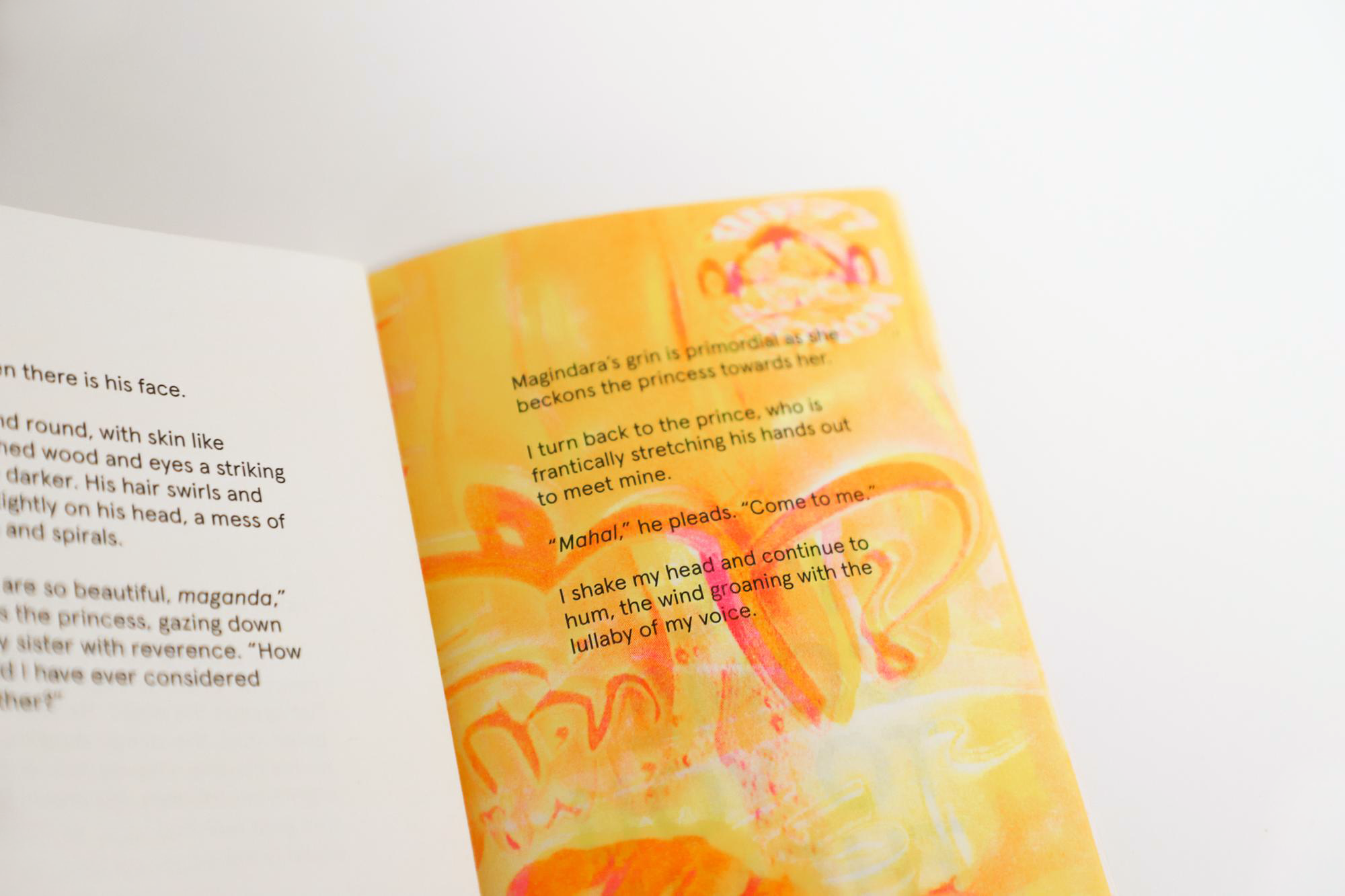 Inside spread of "The Depths to Which We Sink." Left page is black text on a white background and right page is black text printed on a yellow, orange, and pink risograph image.