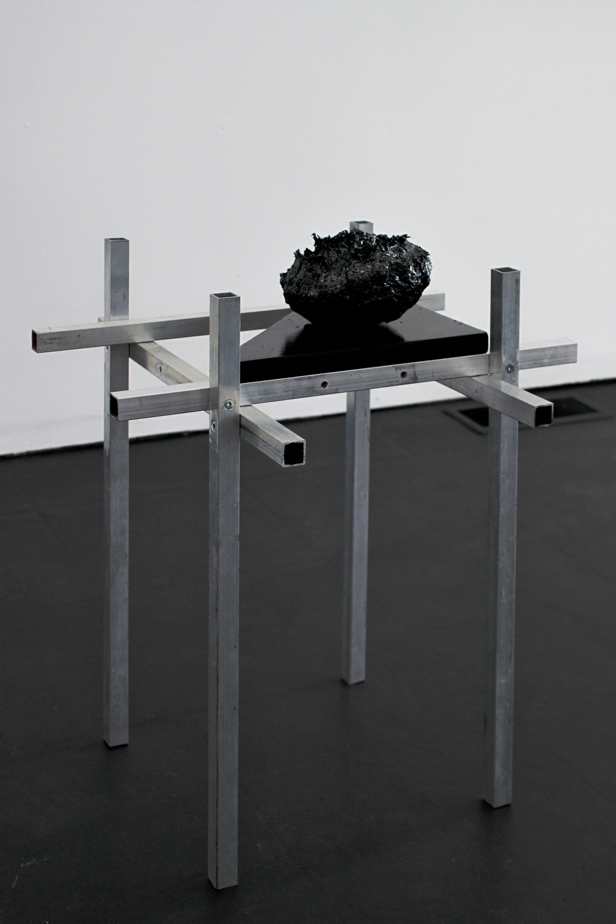 Arson for the cadastral plane, 2018, burnt antifreeze, extruded aluminum, heat-resistant shelf, 20 x 18 x 18 in. (51 x 46 x 46 cm)