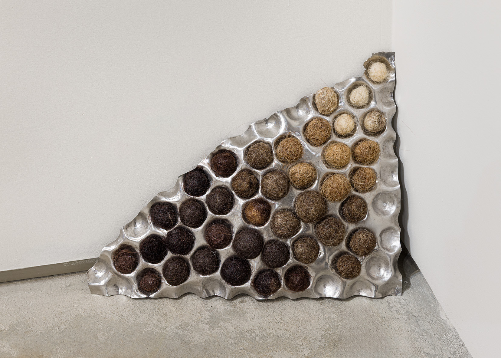 Magdalena Dukiewicz, Object #4, 2022. Artist’s hair, steel, 10 x 13 x 2 inches. Photo by Etienne Frossard.