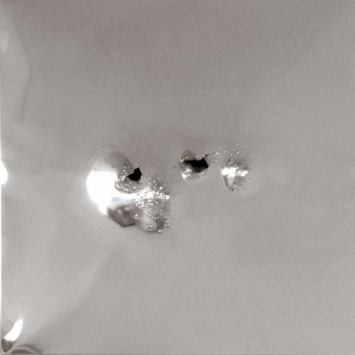 Los Lunas #9, 2005, stainless steel with gunshot, 46x46 in