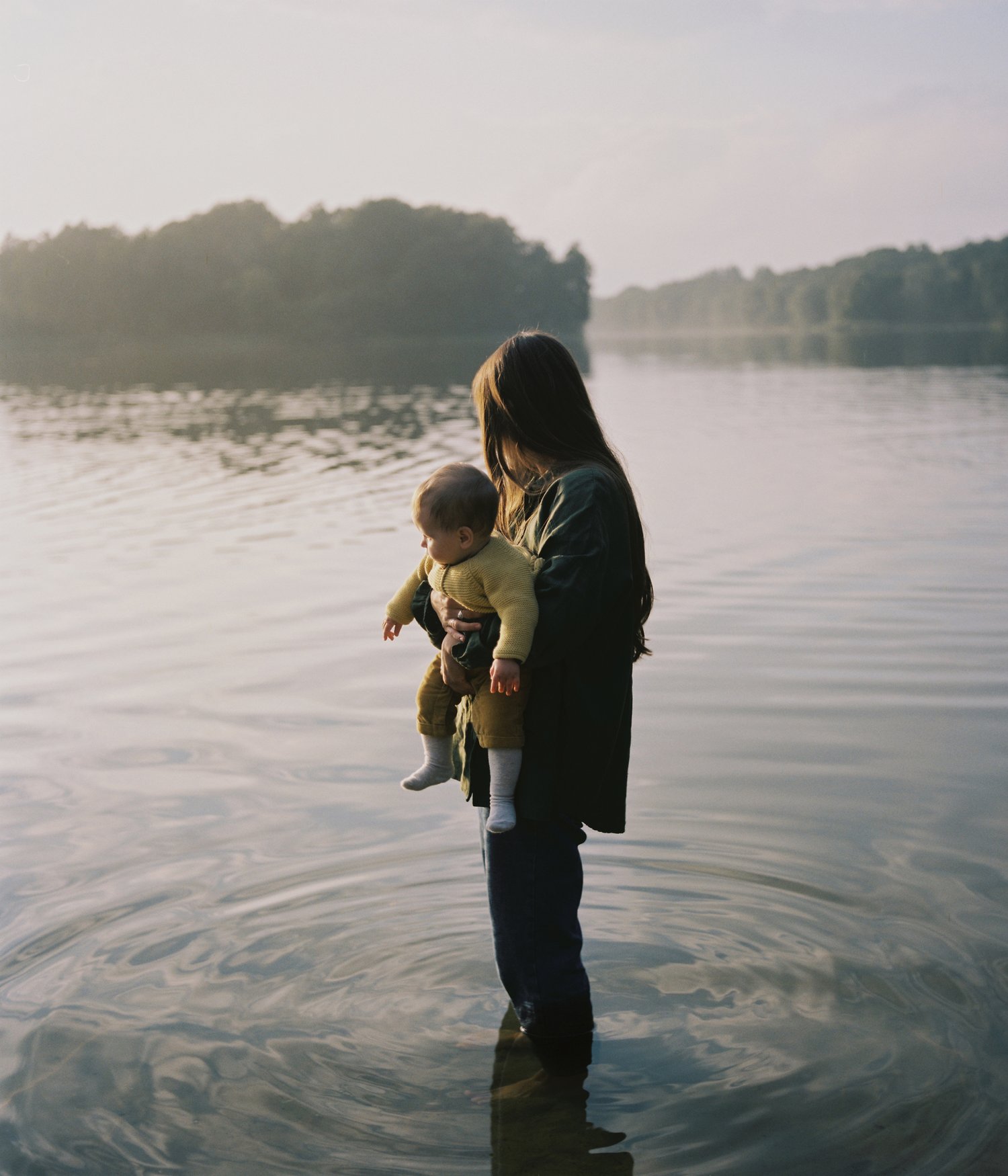 Self-portrait with Mila in the lake. Gniezno, Poland, 2021