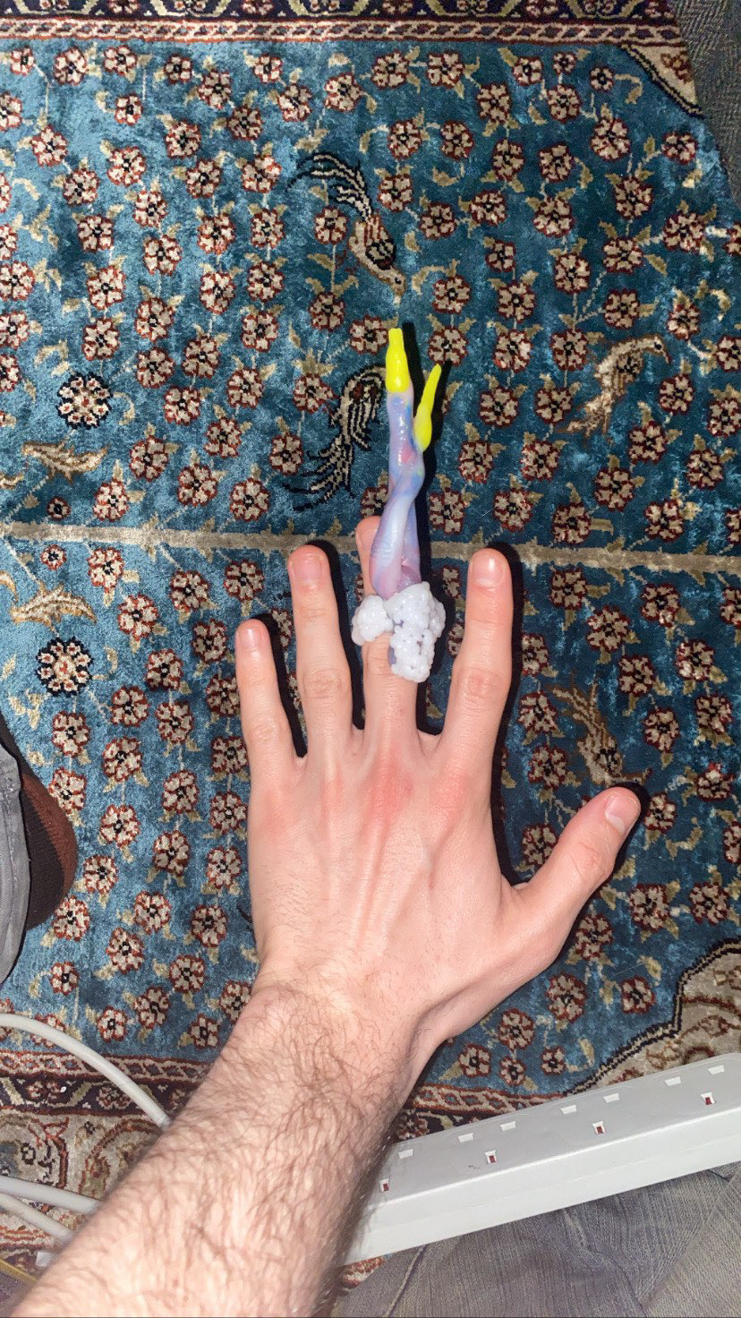 Vampire finger crossing ring with her hand- Pablo