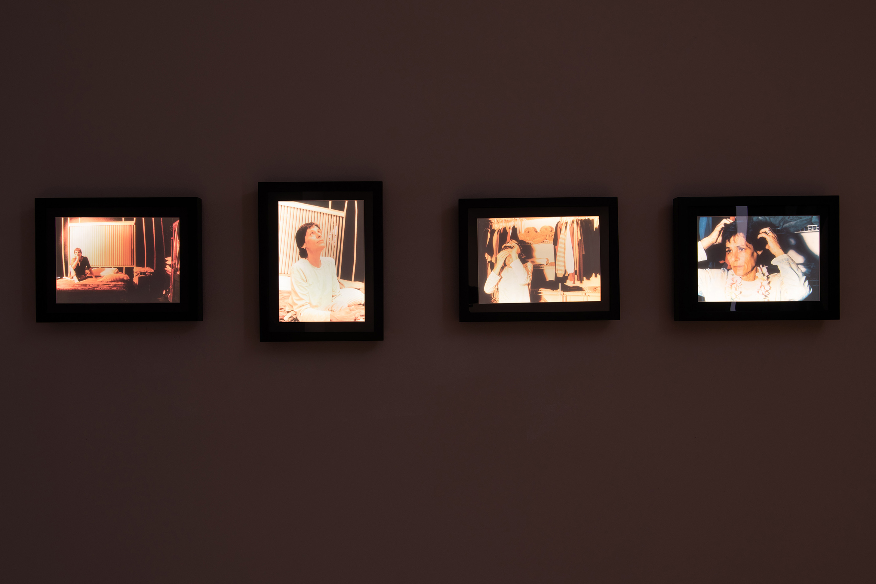 Installation view, "Althea in her bedroom I/II," "Althea in her wardrobe I/II," 2008 (printed 2022), transparencies in LED lightboxes, each 9" x 12" x 1"