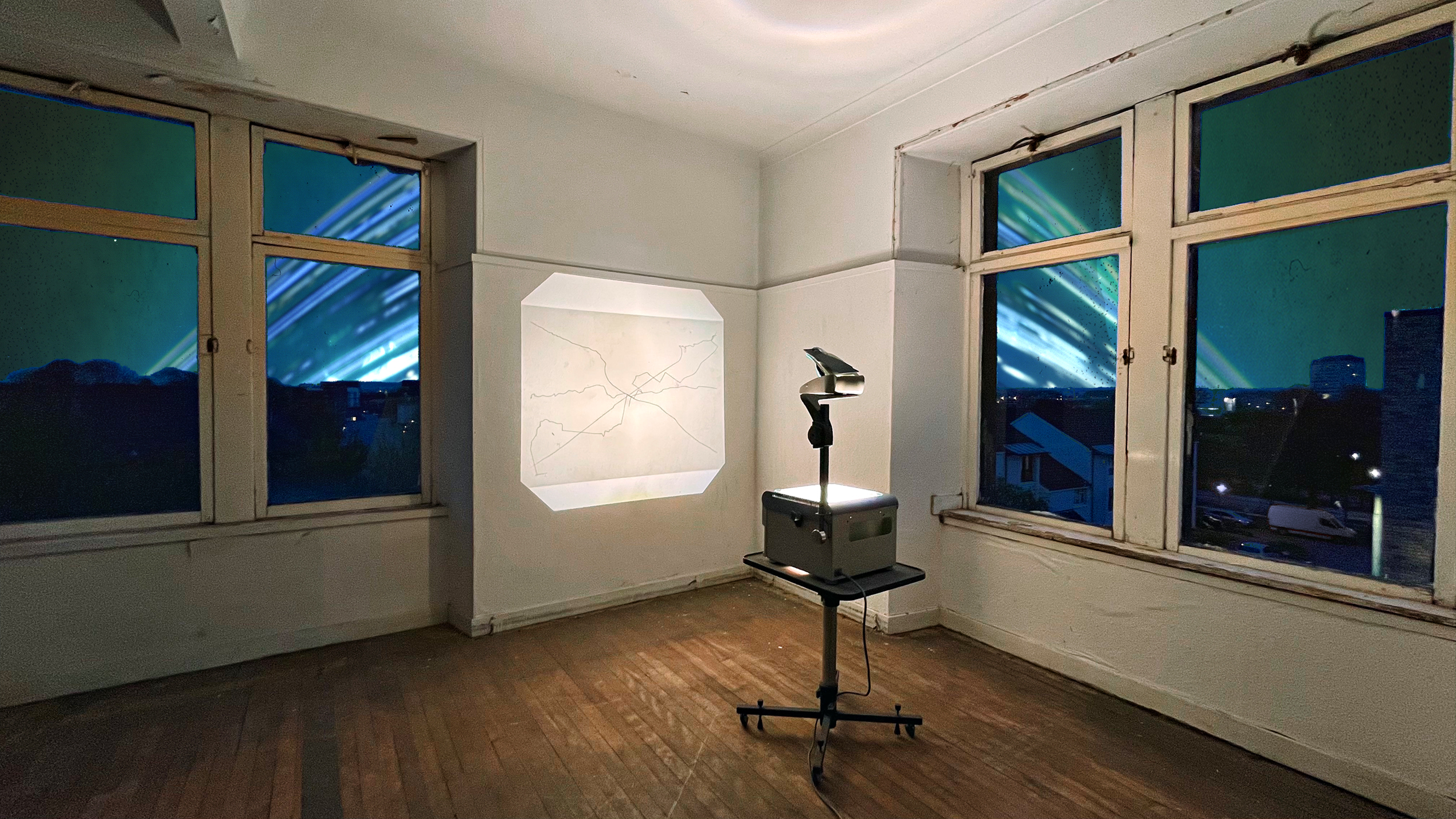 photomontage: solar cycle on overhead projector, exhibition test view ; analog solargraph, view from my balcony, 56 days.