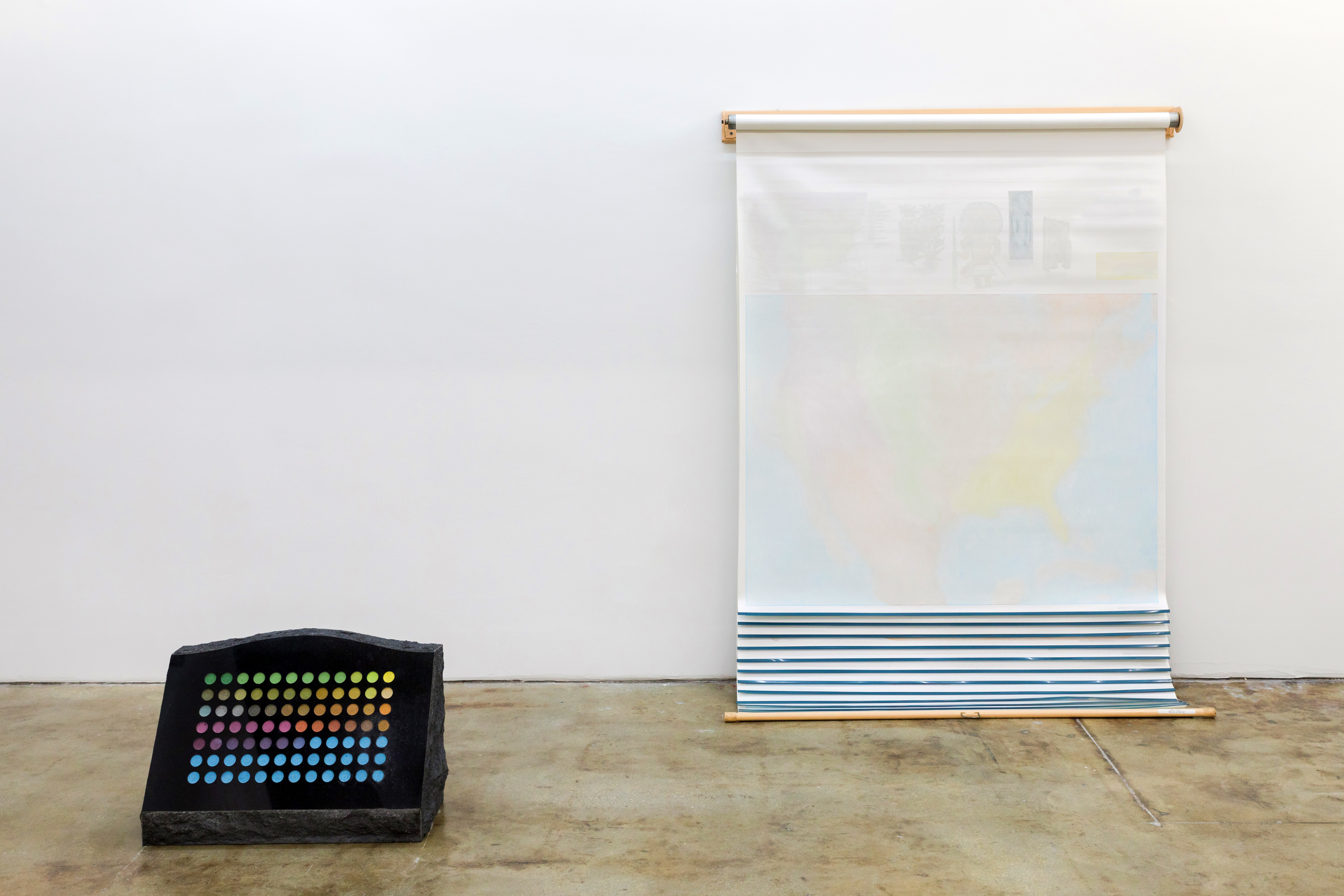The Country in Flames, (Maps and dust diptych), 2017-2019Hand-sanded US pull down map (American History Series)Pulverized ink extracted from U.S. pull down-map embedded on black granite tombstone