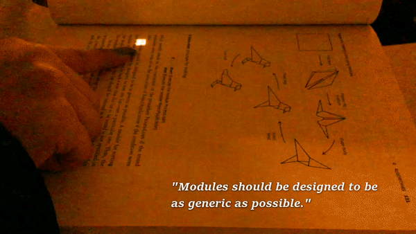 Girl highlighting a book quote with her finger, light trailing behind her finger.