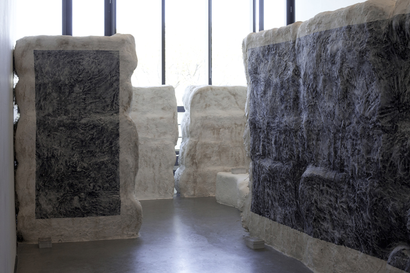 Untitled, 2013, variable size, hay bales, plaster, chalk-board paint, chalk, video, postcards