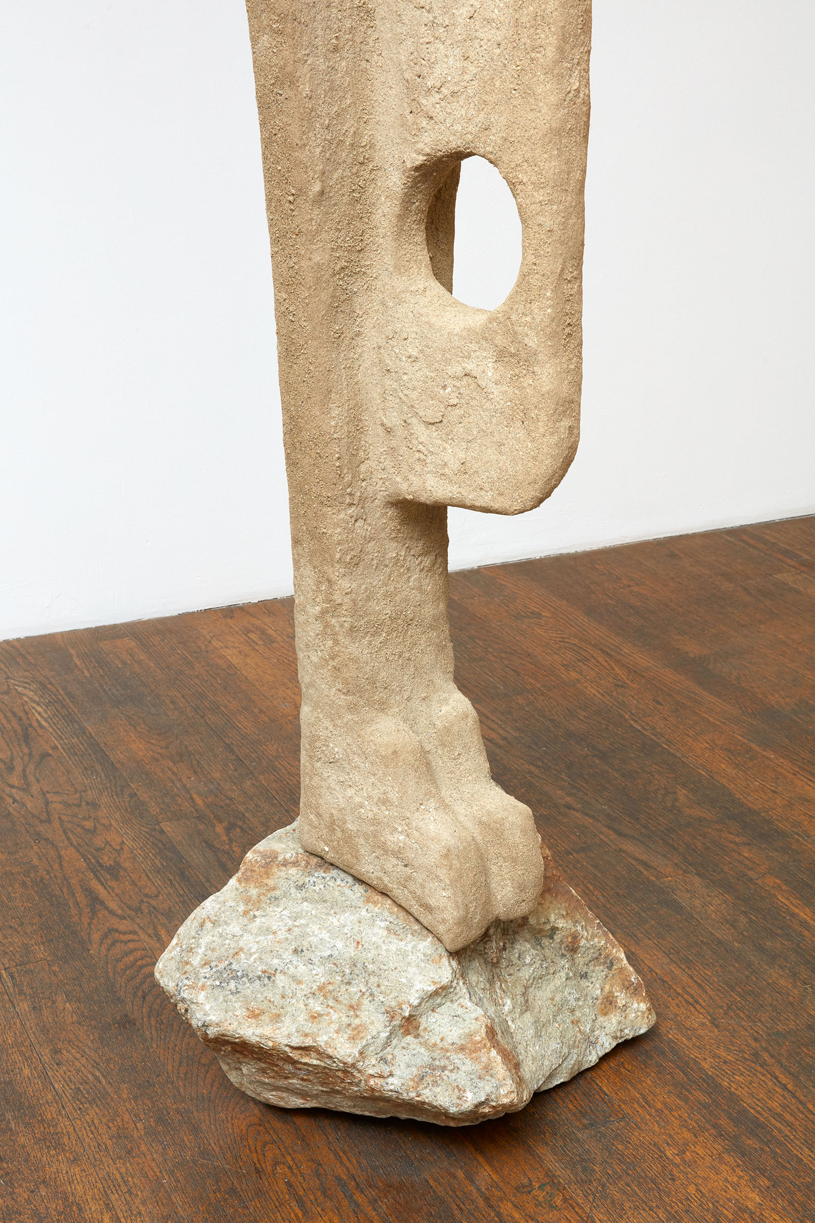 Untitled , 2021, Steel, sand, polymer, burlap, rock, pigeon spikes